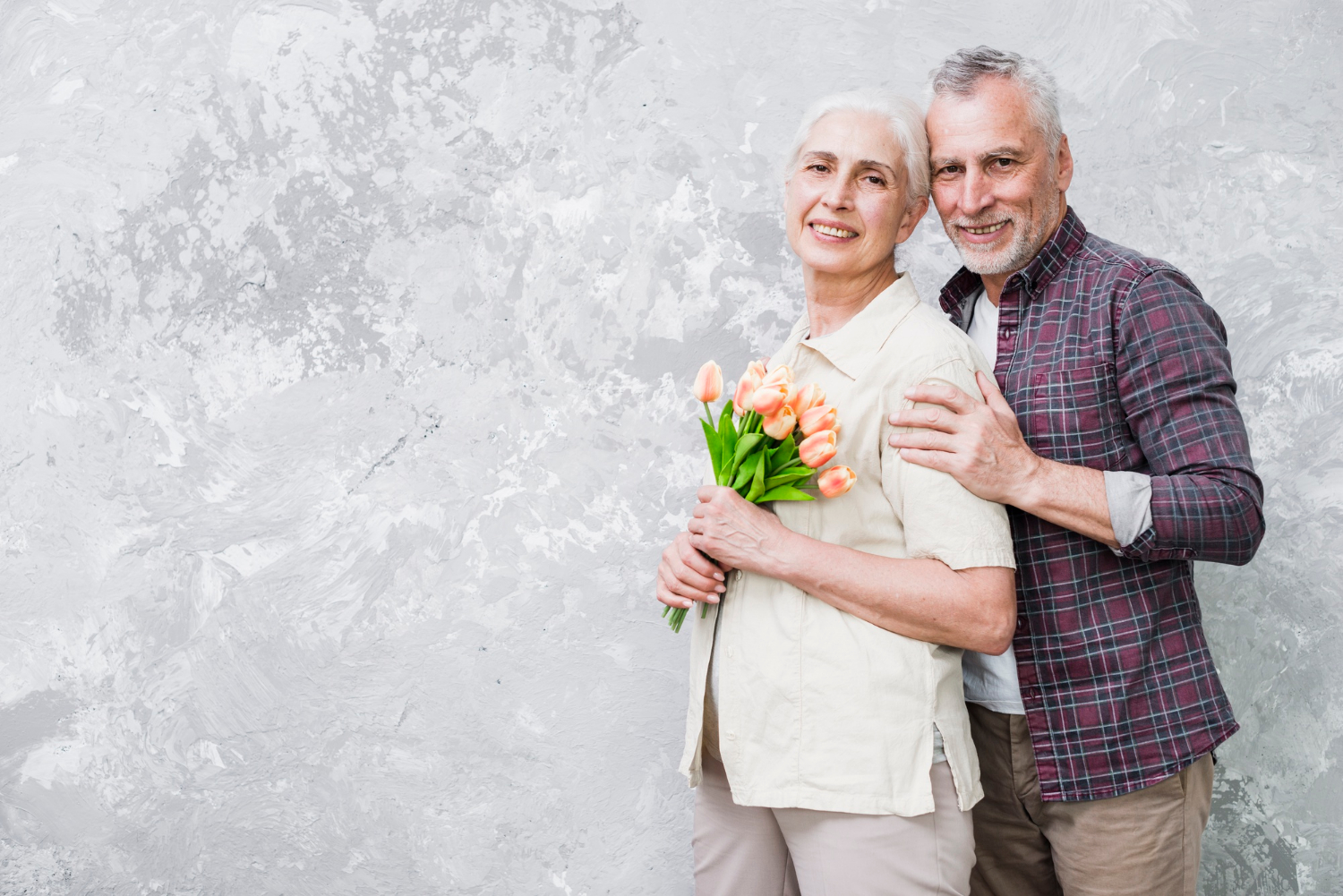 A delighted senior couple | Source: Freepik