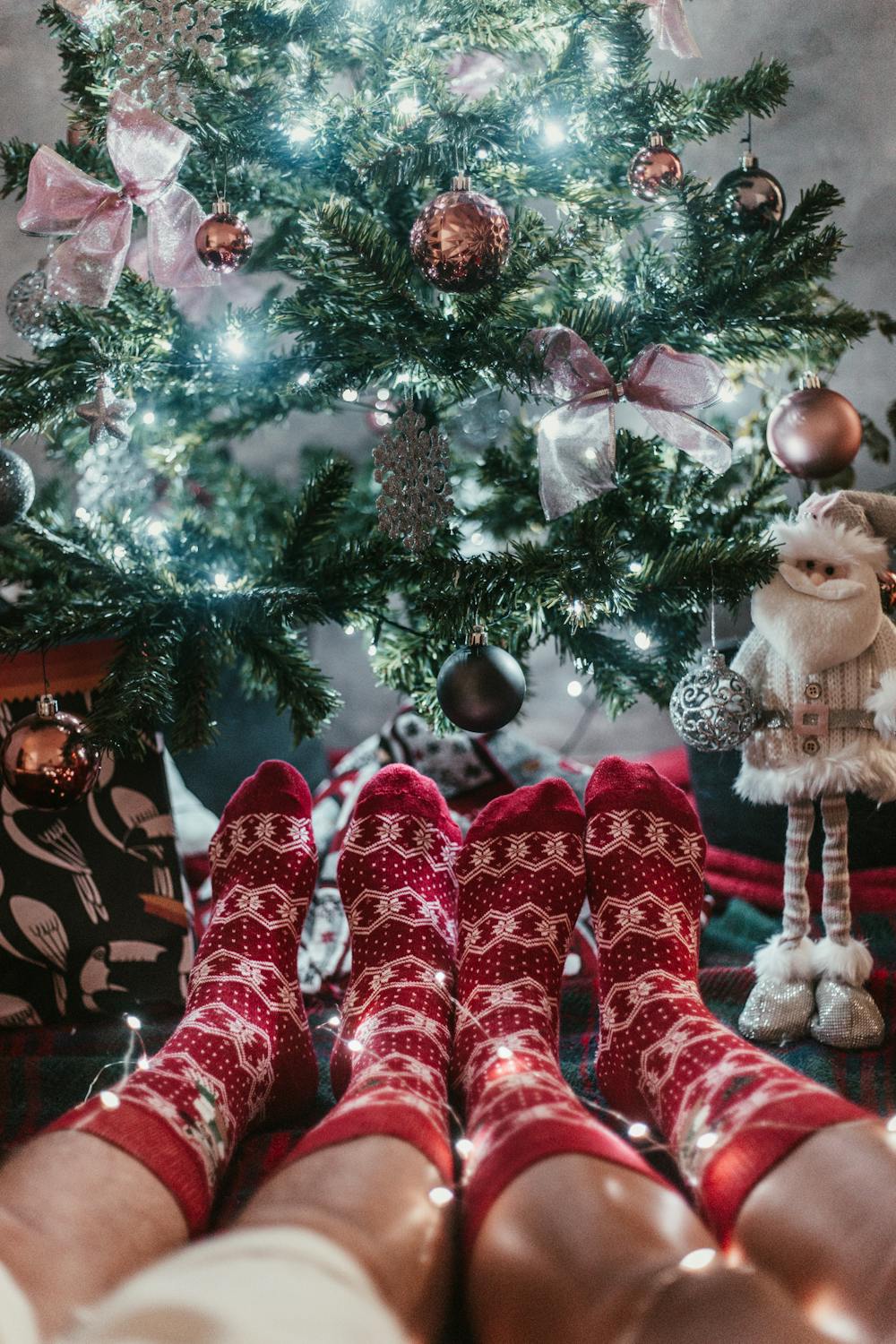 A couple wearing red socks | Source: Pexels