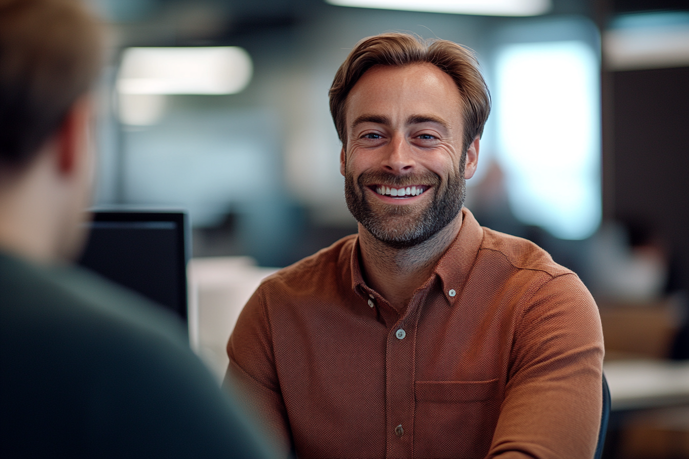 A man laughing at work | Source: Midjourney