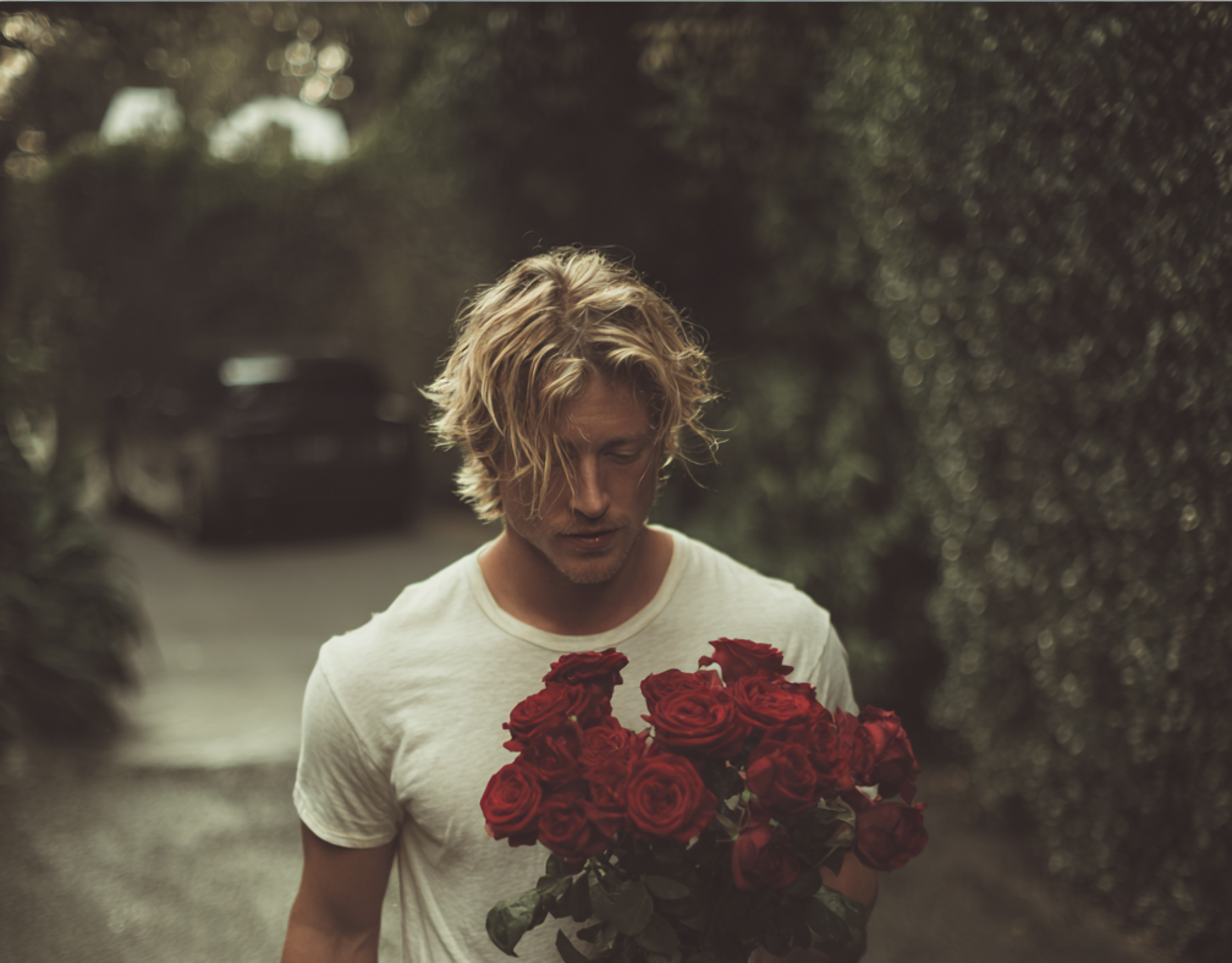 A man walking down a driveway | Source: Midjourney