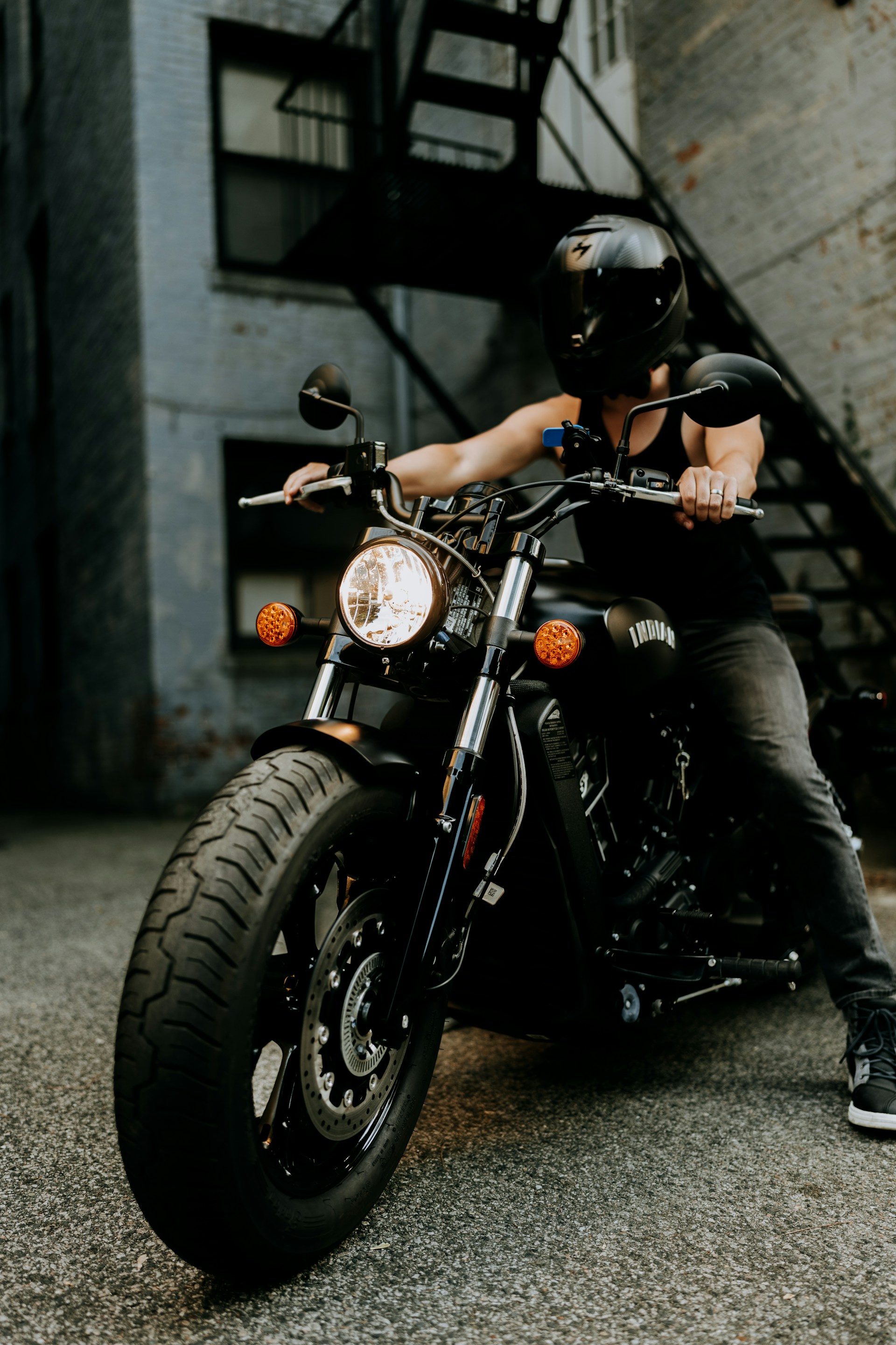A man sitting on a motorcycle | Source: Unsplash