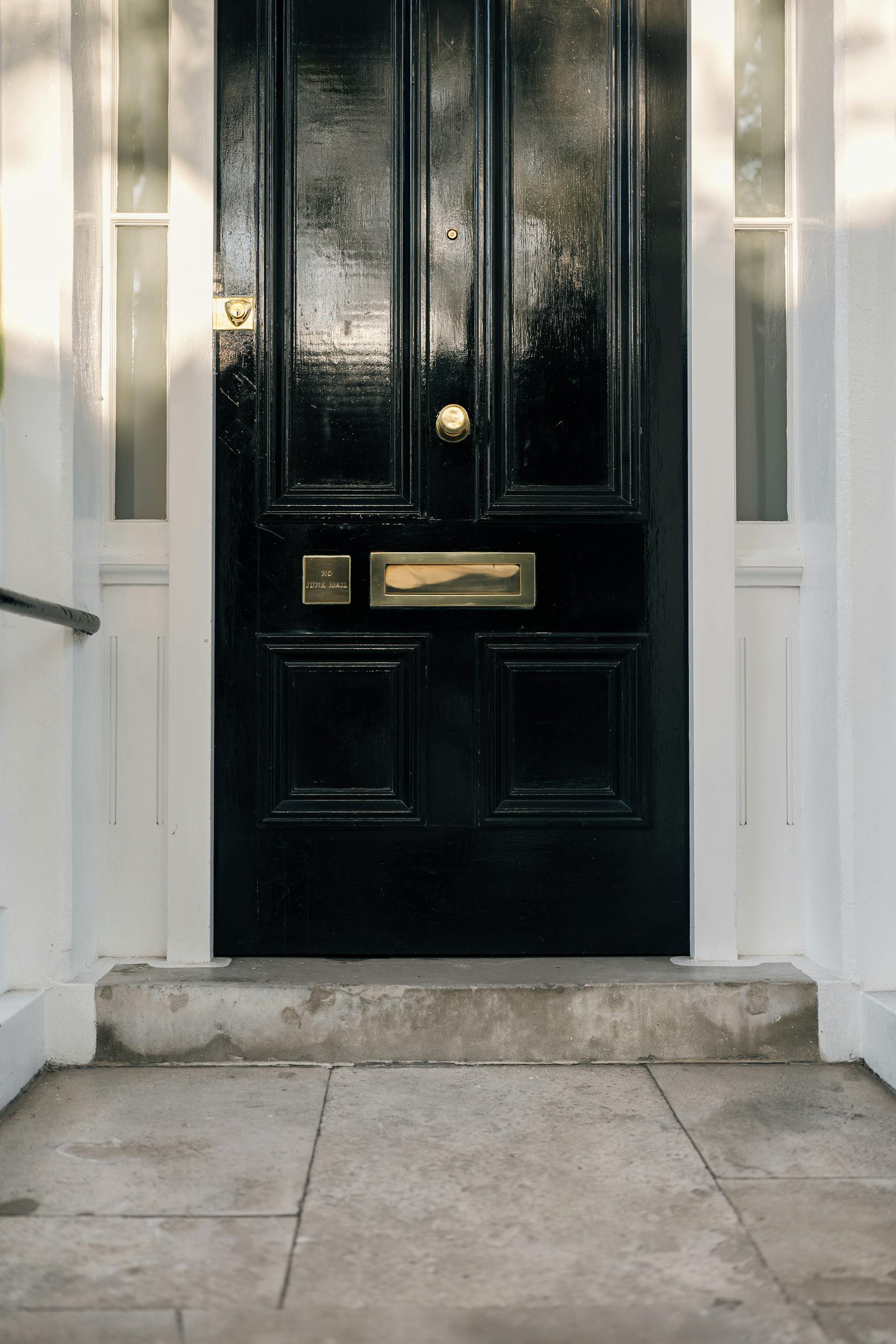 A front door with a mail slot | Source: Pexels