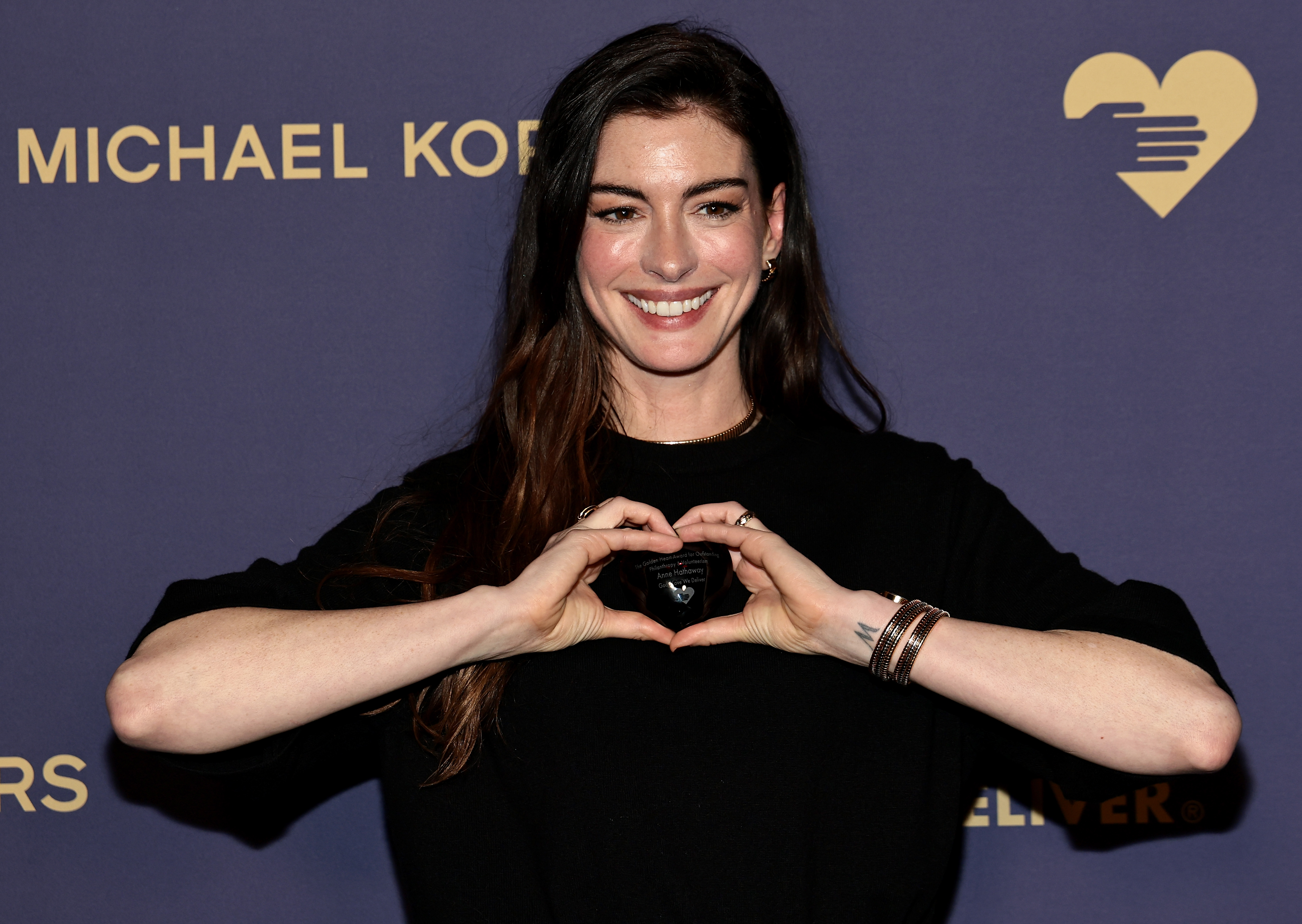 Anne Hathaway attends God's Love We Deliver 2025 Golden Heart Awards at Cathedral of St. John the Divine on October 20, 2025 in New York City. | Source: Getty Images