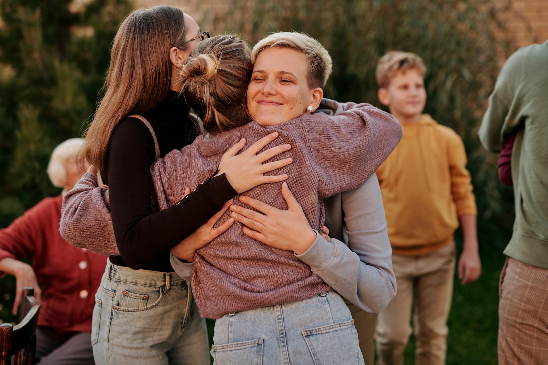 Women hugging at a family gathering | Source: Pexels