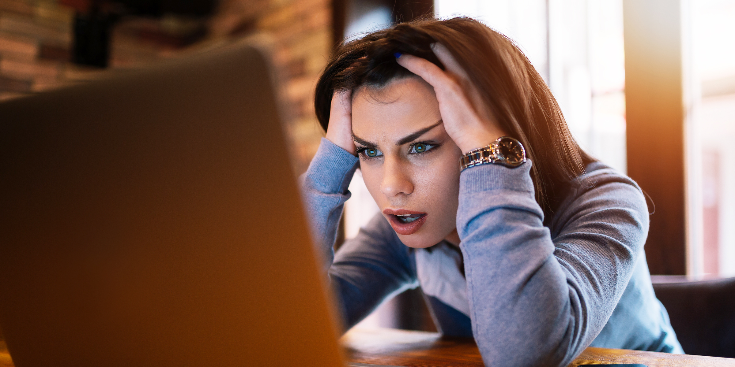 A woman reading an email | Source: Shutterstock