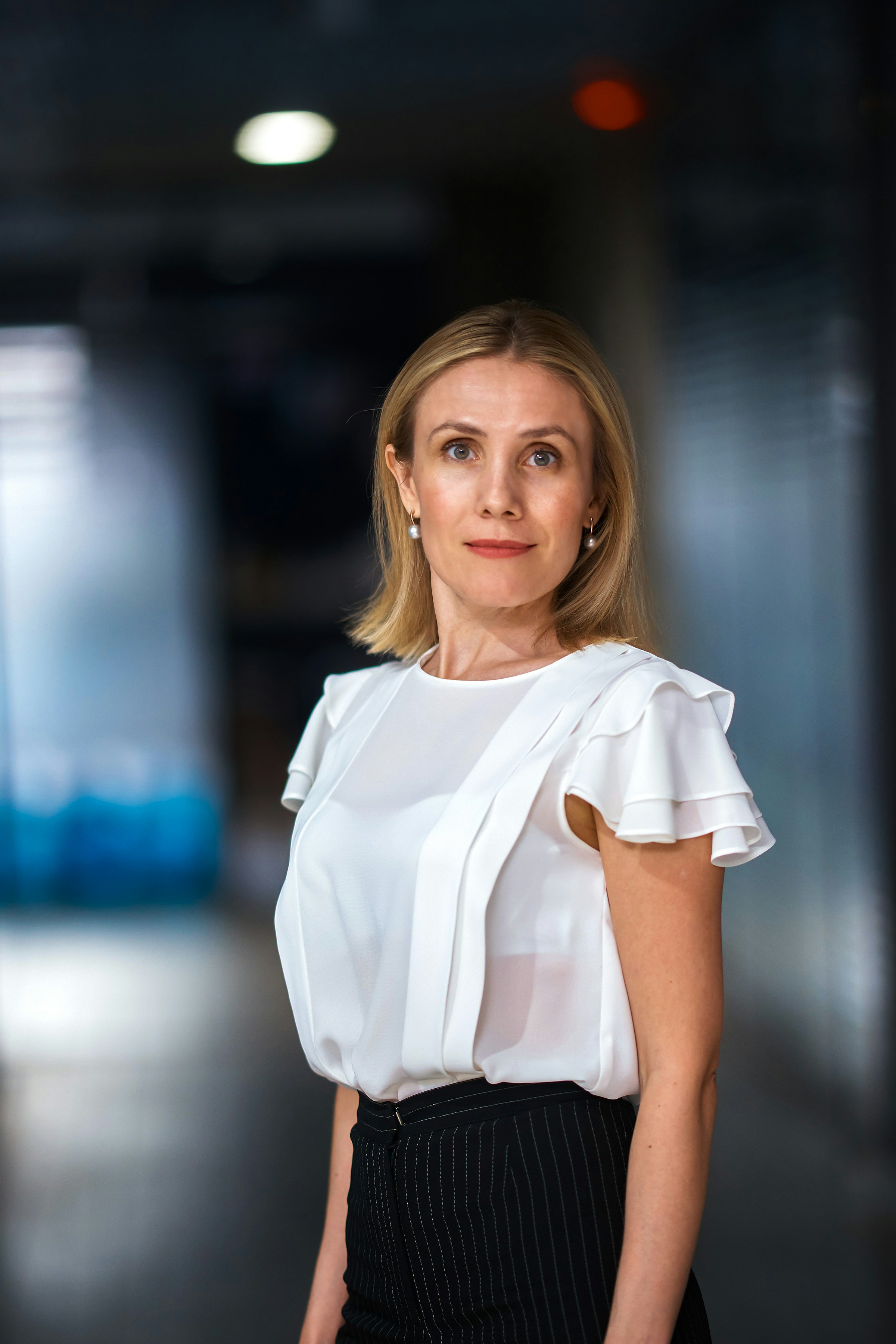 A businesswoman smiling at the camera | Source: Unsplash