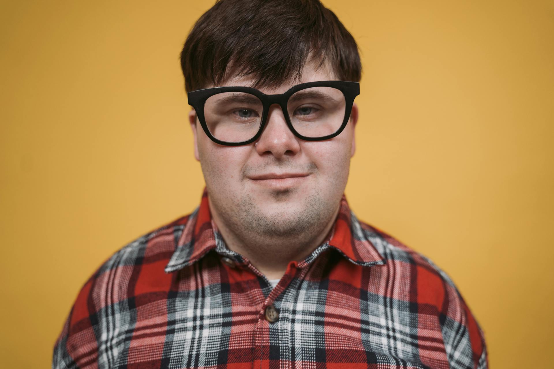 A young man with Down syndrome | Source: Pexels