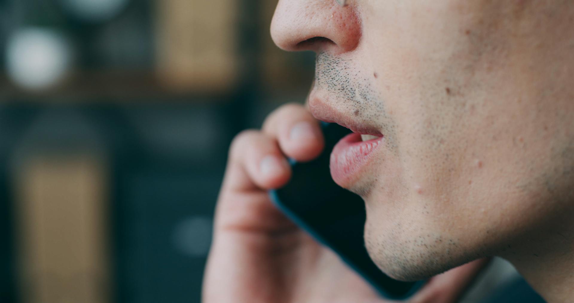 A man speaking on his cell phone | Source: Pexels