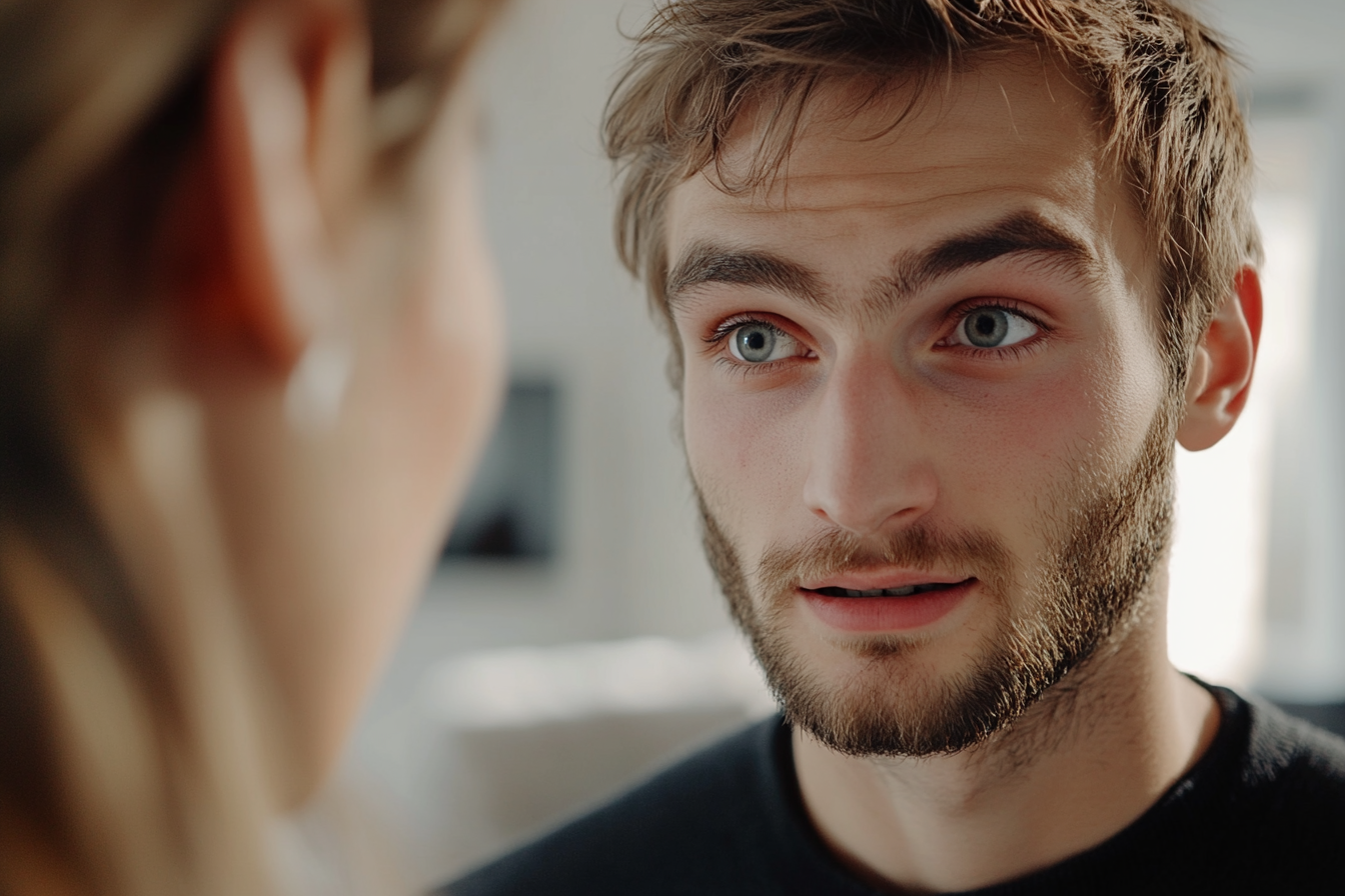 A man speaking to a woman | Source: Midjourney
