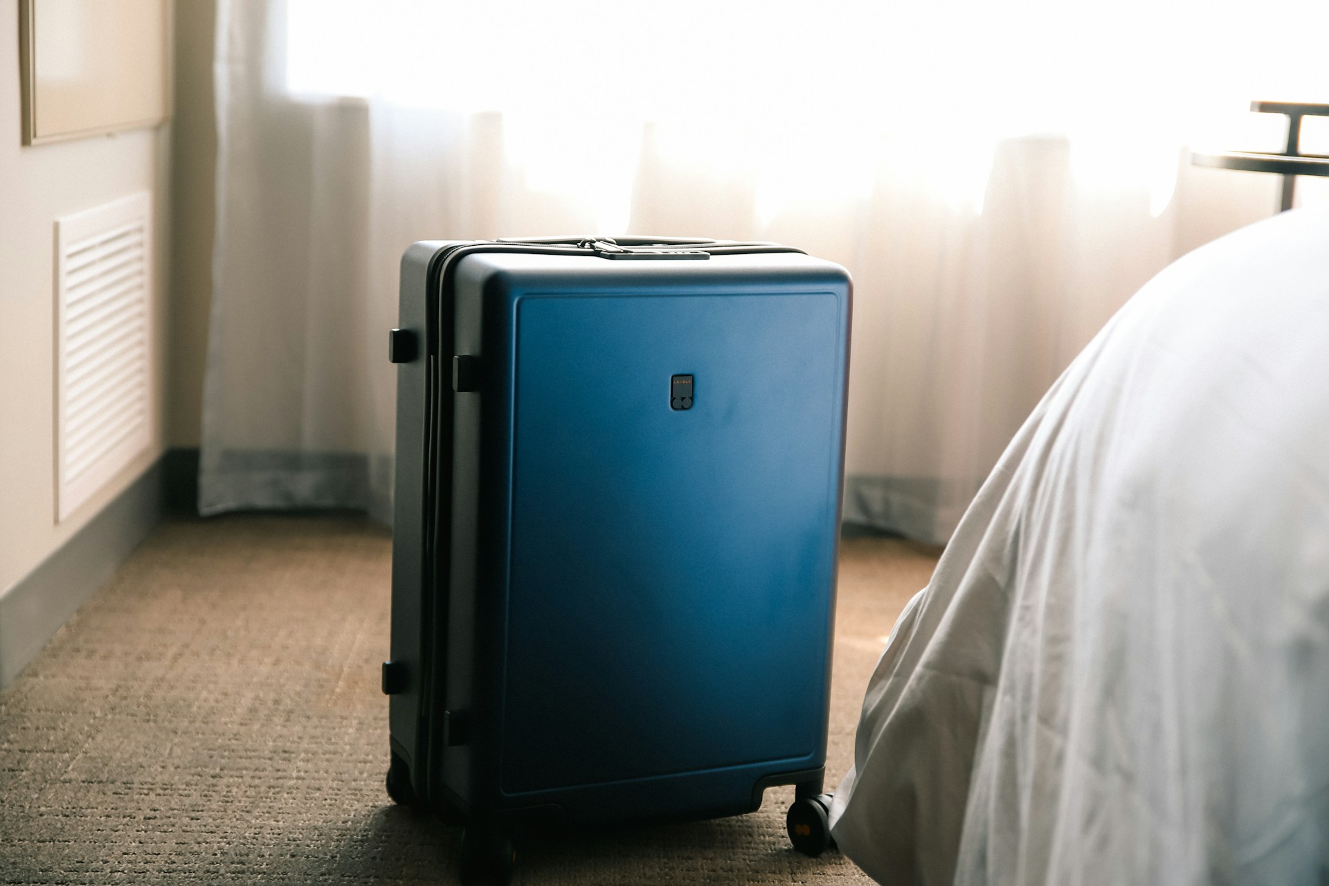 A suitcase in a room | Source: Unsplash