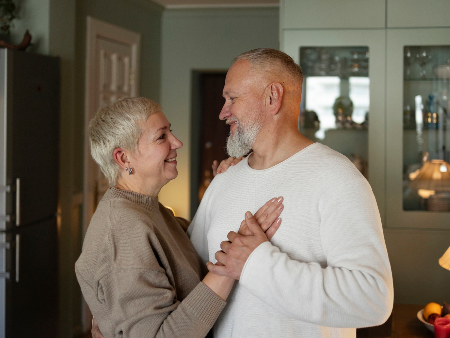 A senior couple looking at each other with love and understanding | Source: Freepik