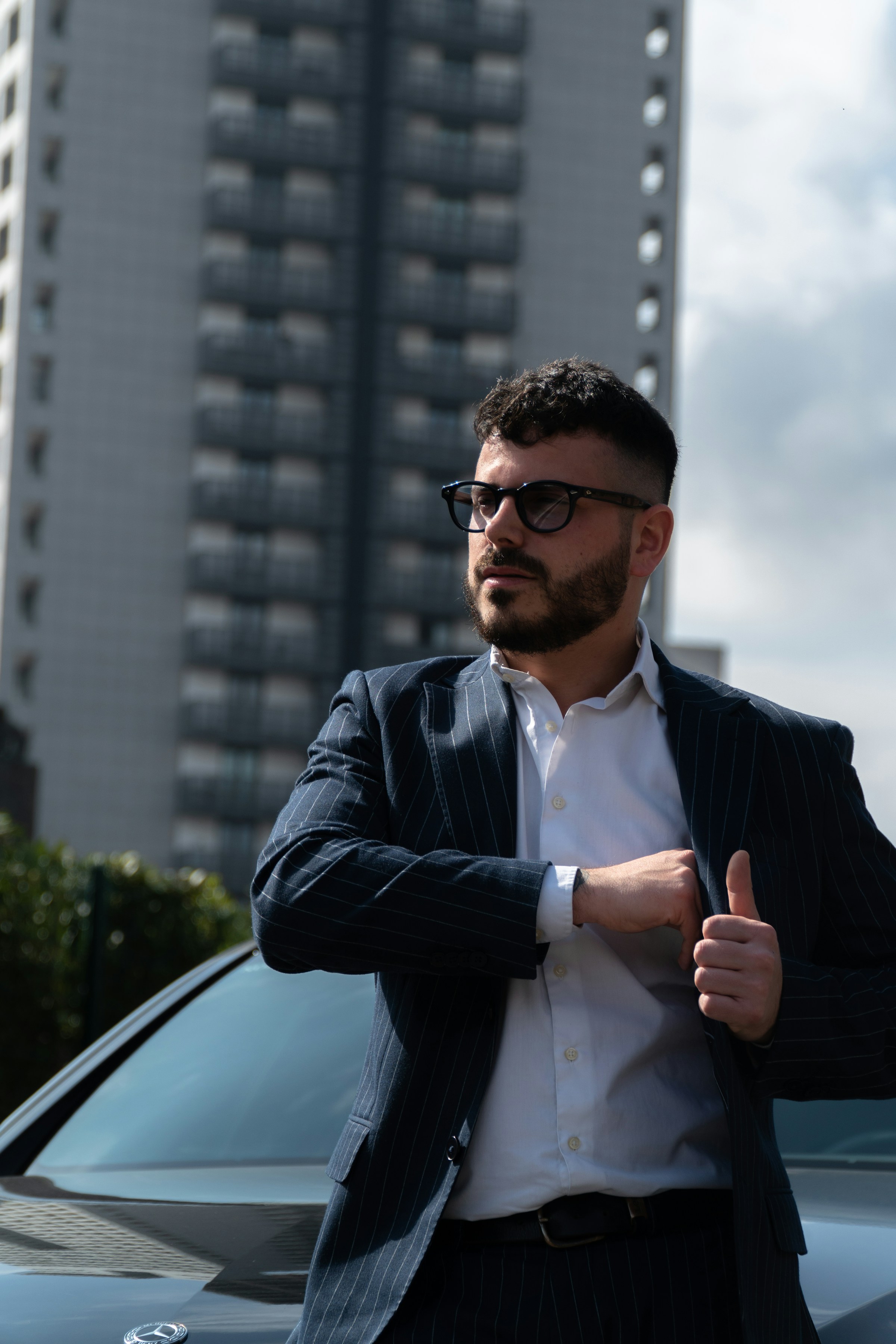 A man waiting by a car | Source: Unsplash
