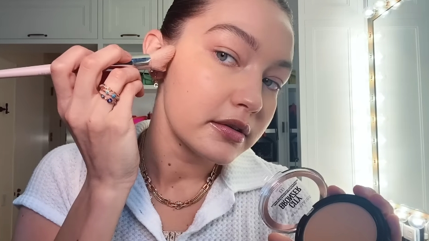 Gigi Hadid doing her makeup routine from a video dated February 4, 2021. | Source: YouTube/Vogue