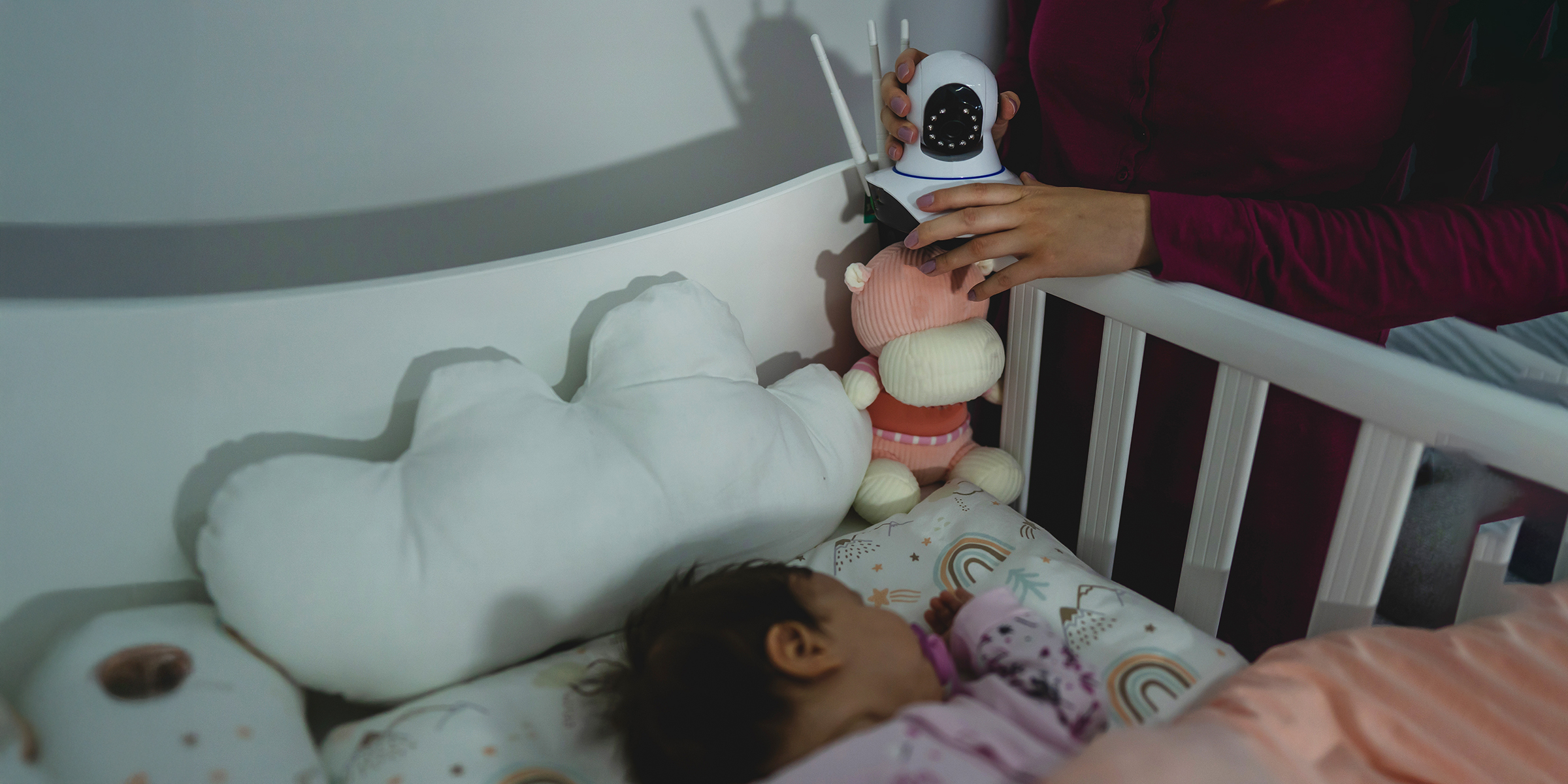 Woman setting a baby monitor | Source: Shutterstock