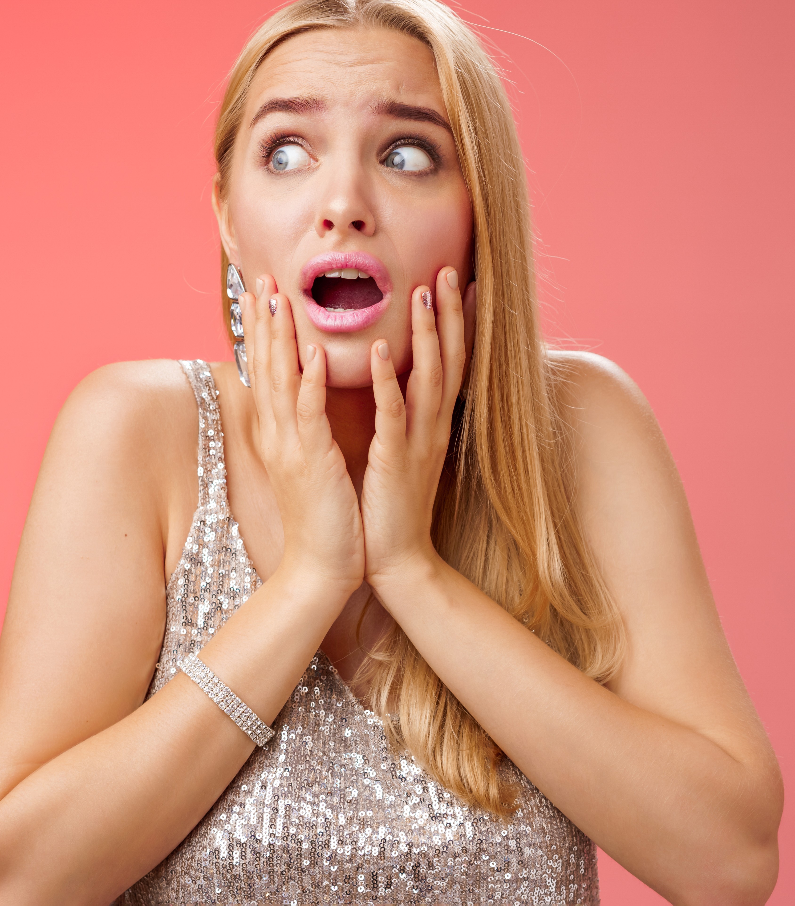 A stunned young woman | Source: Freepik