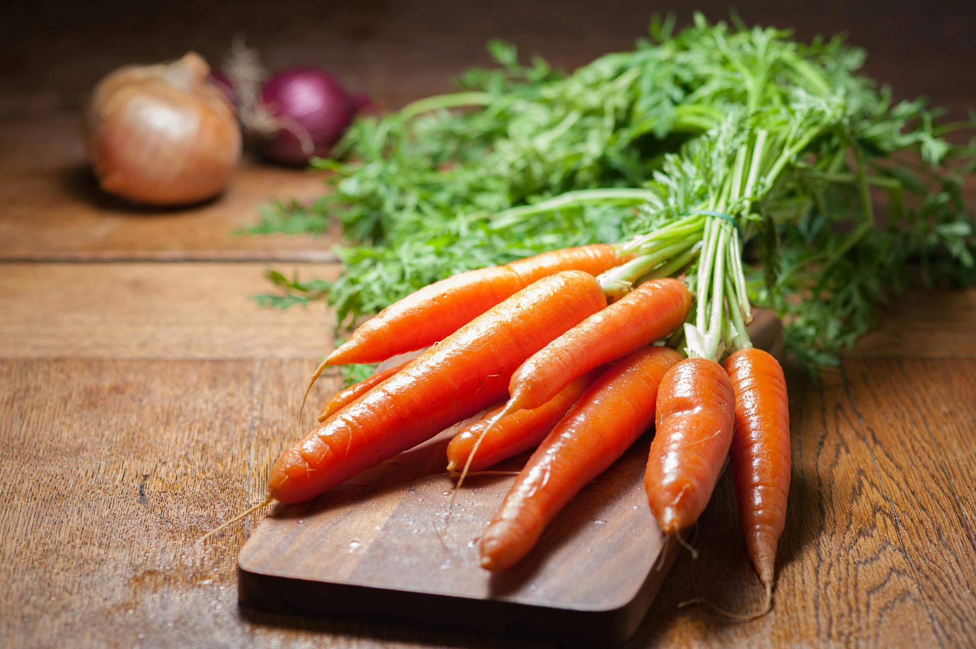 Carrots on a cutting board | Source: Pexels