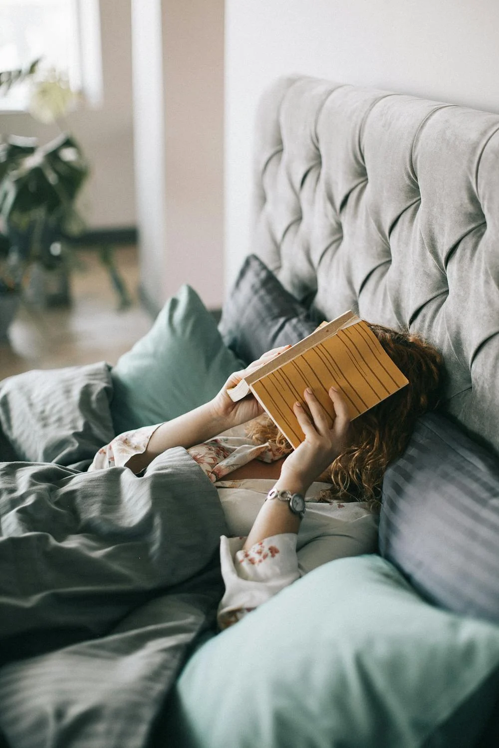 A woman covering her face with her hands | Source: Pexels