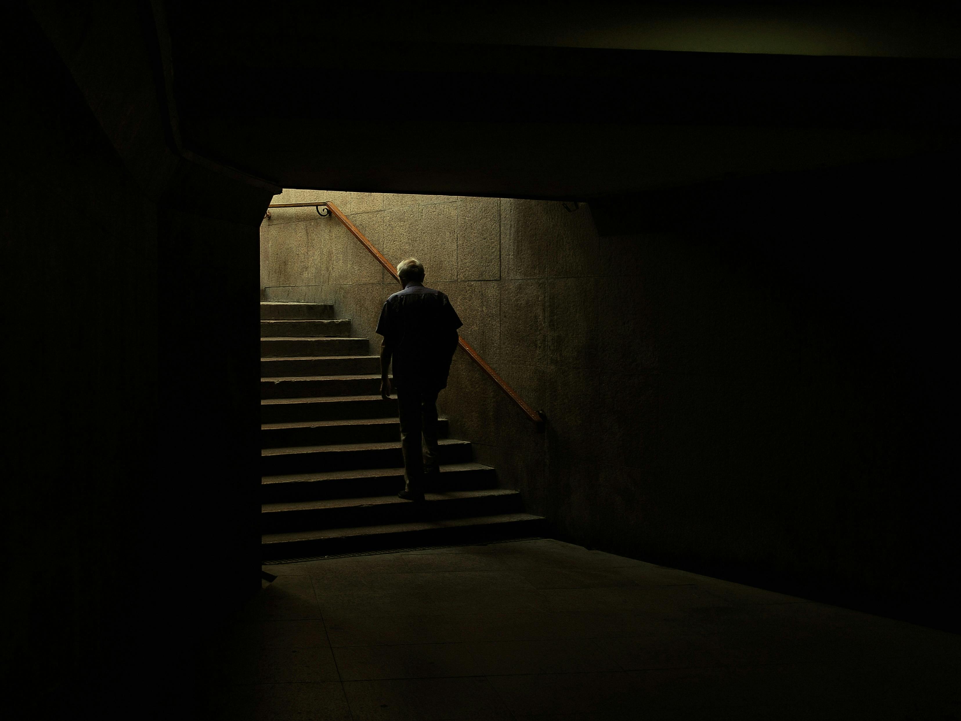 A man walking upstairs | Source: Pexels