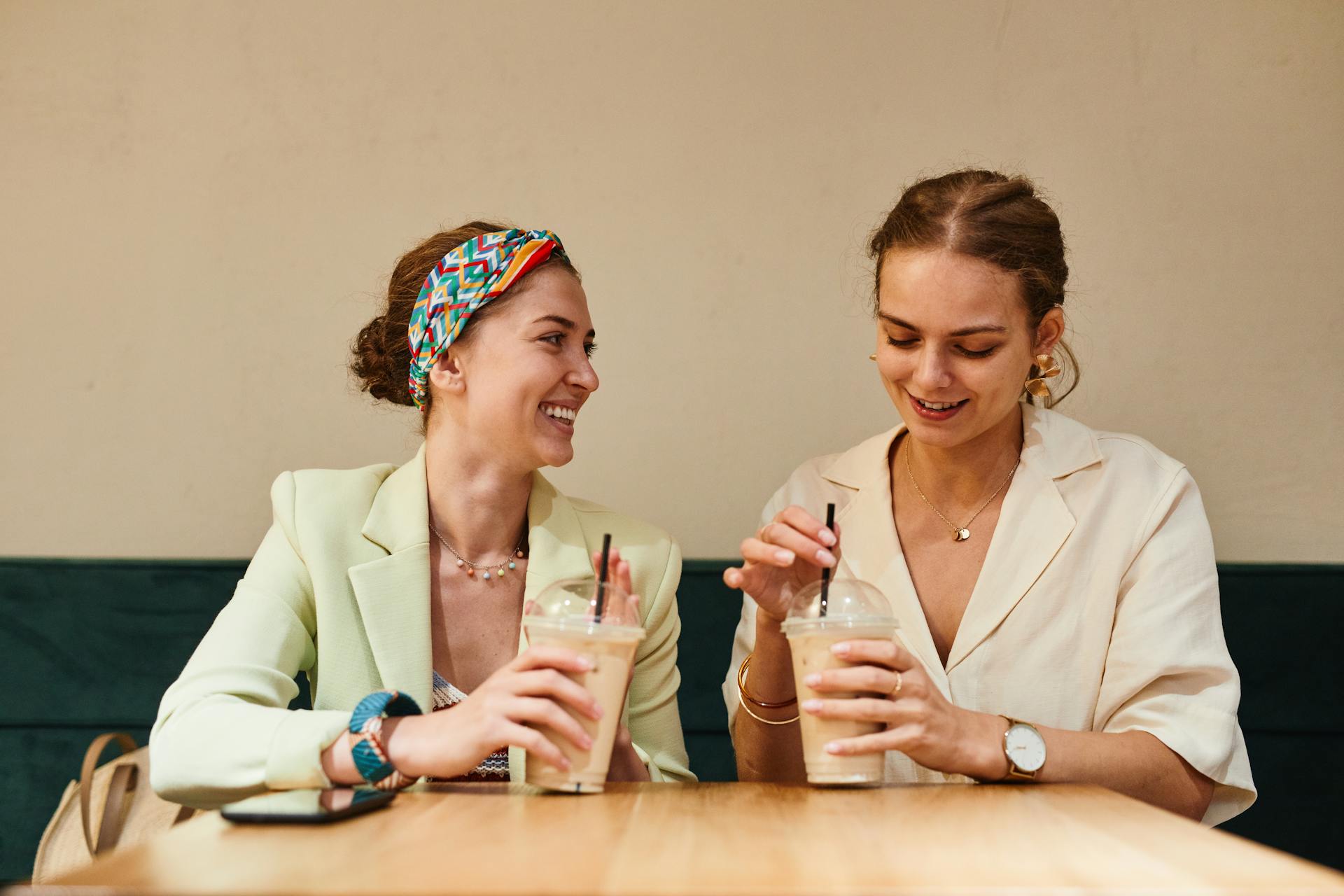 Two women in a coffee shop | Source: Pexels