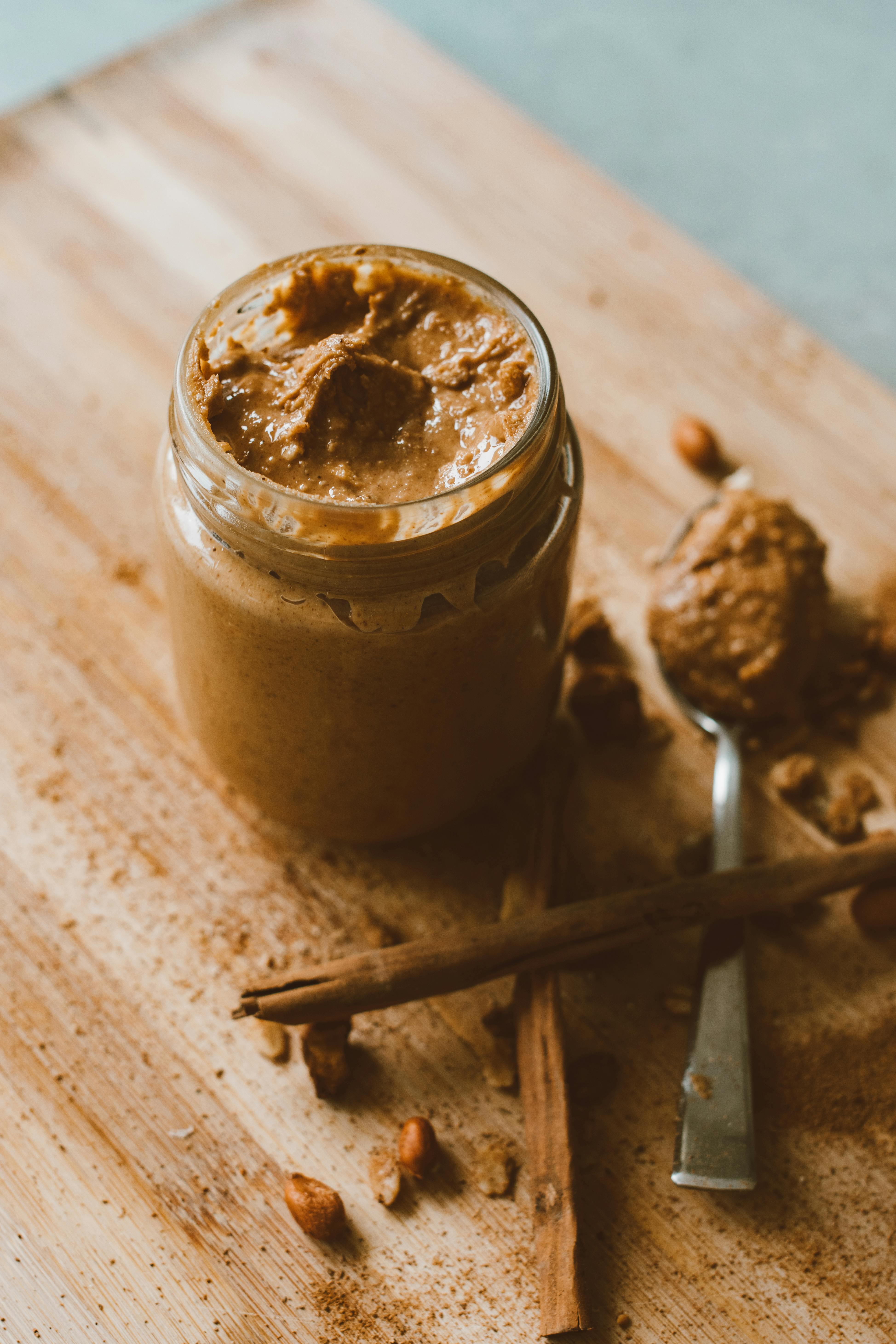 A jar of cinnamon and almond butter | Source: Pexels