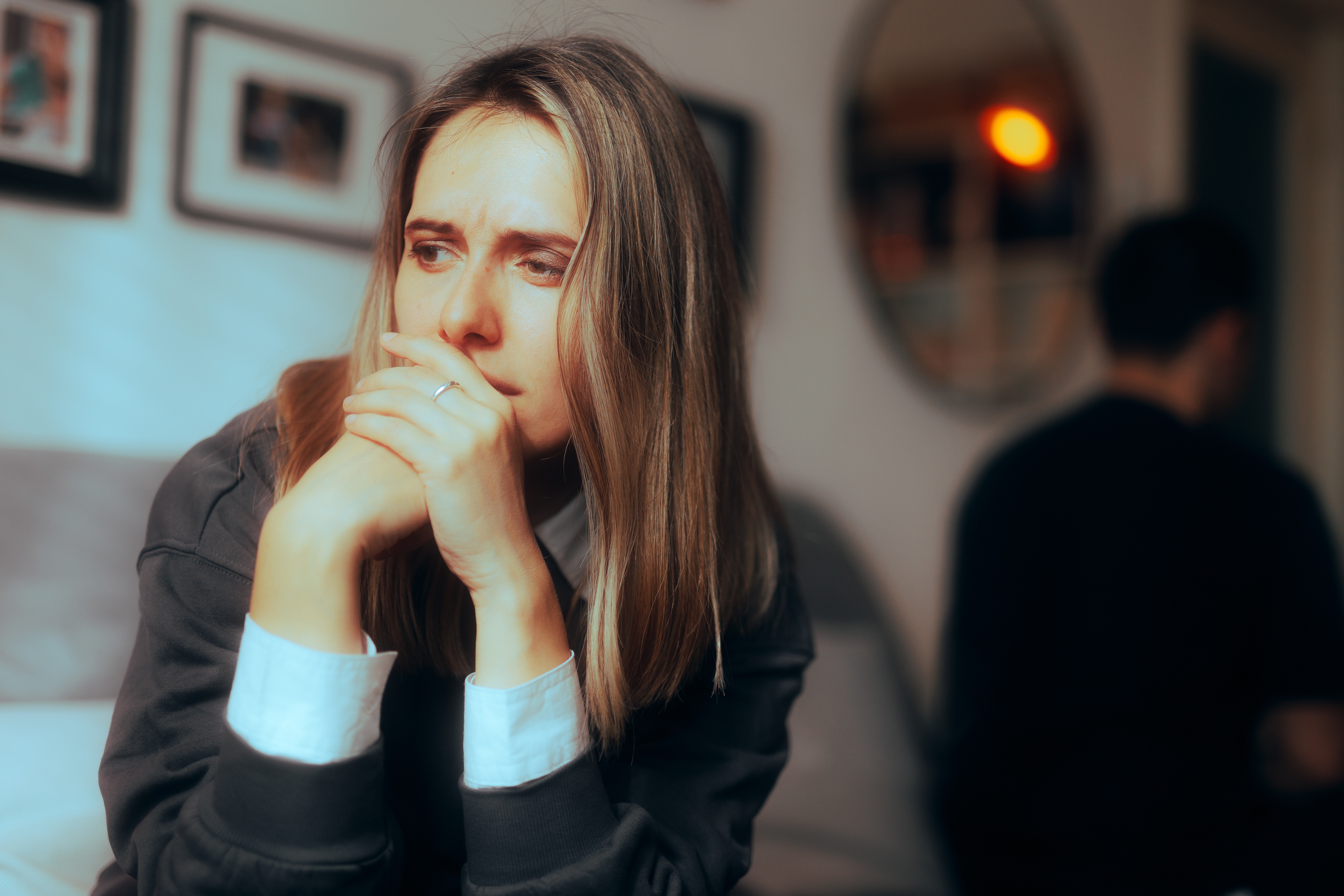 A woman sitting alone after an argument with her husband | Source: Shutterstock