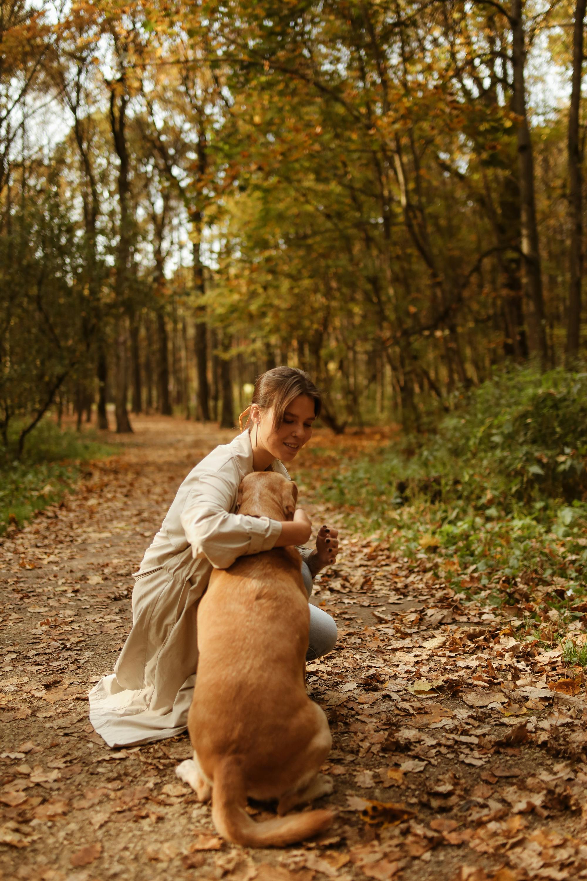 A woman with her dog | Source: Unsplash