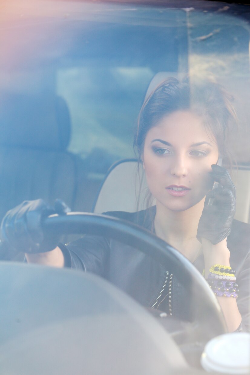 A woman driving | Source: Freepik