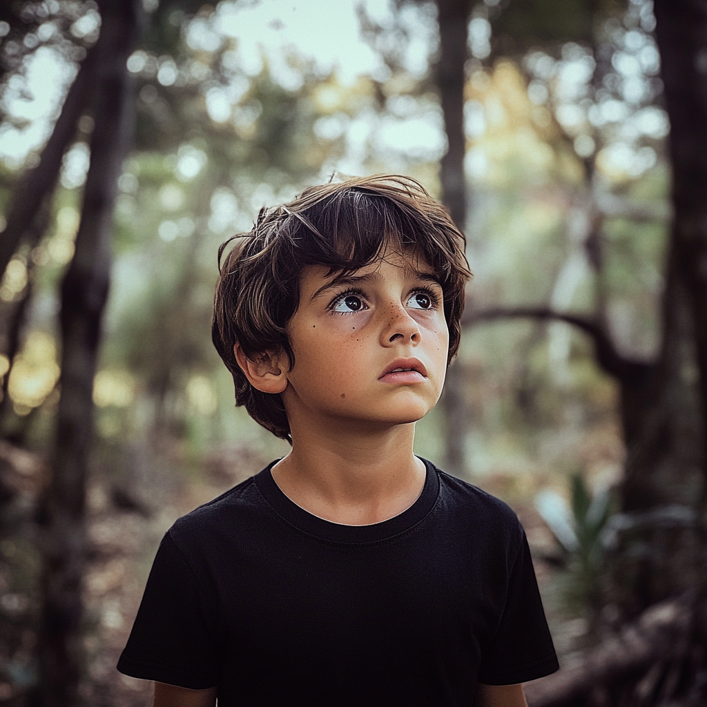 A boy in the woods | Source: Midjourney