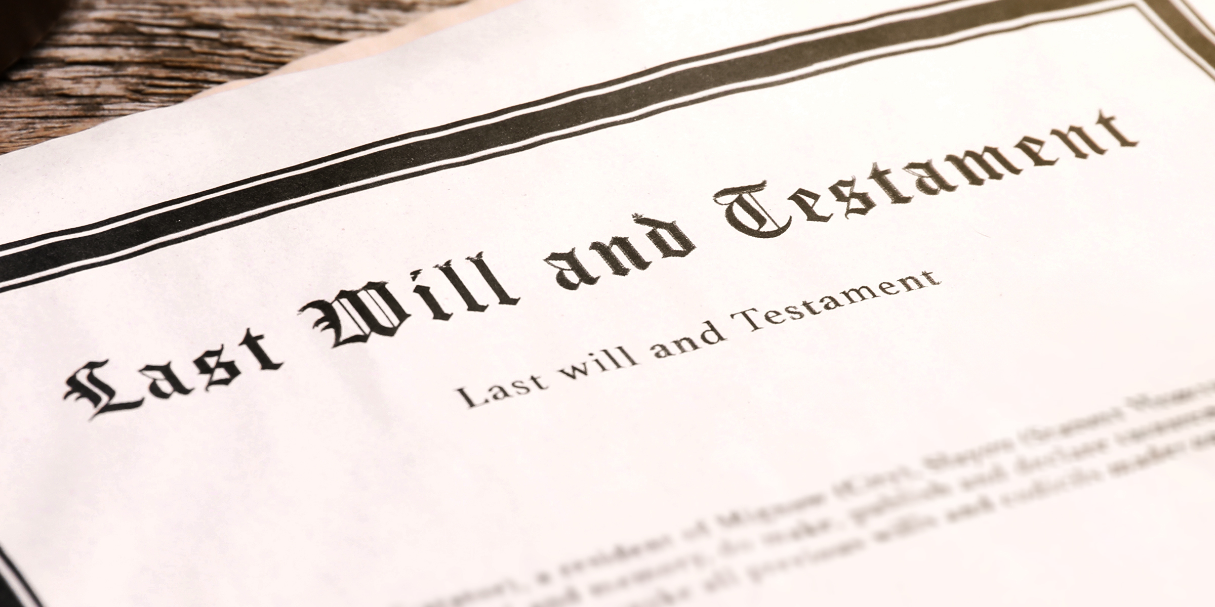 A close-up of a legal document titled "Last Will and Testament" | Source: Shutterstock