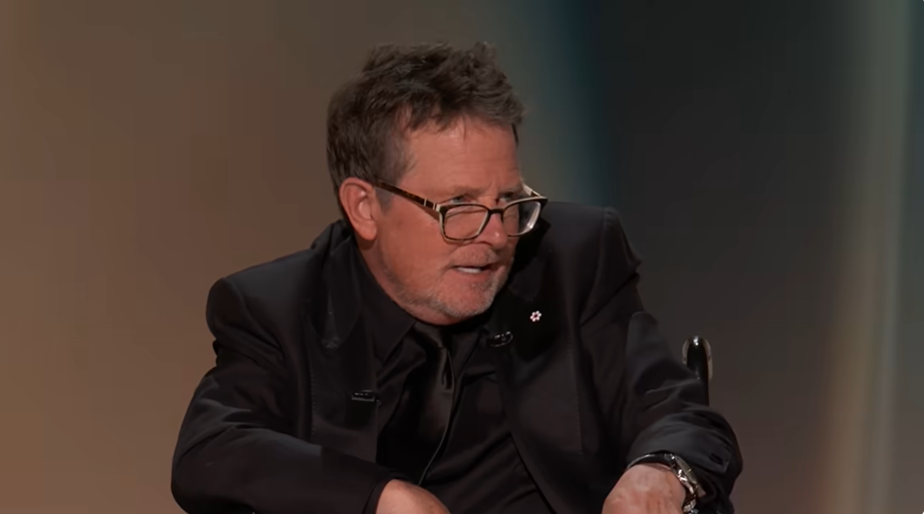 Michael J. Fox speaks onstage during the 78th Emmy Awards ceremony. | Source: YouTube/Television Academy