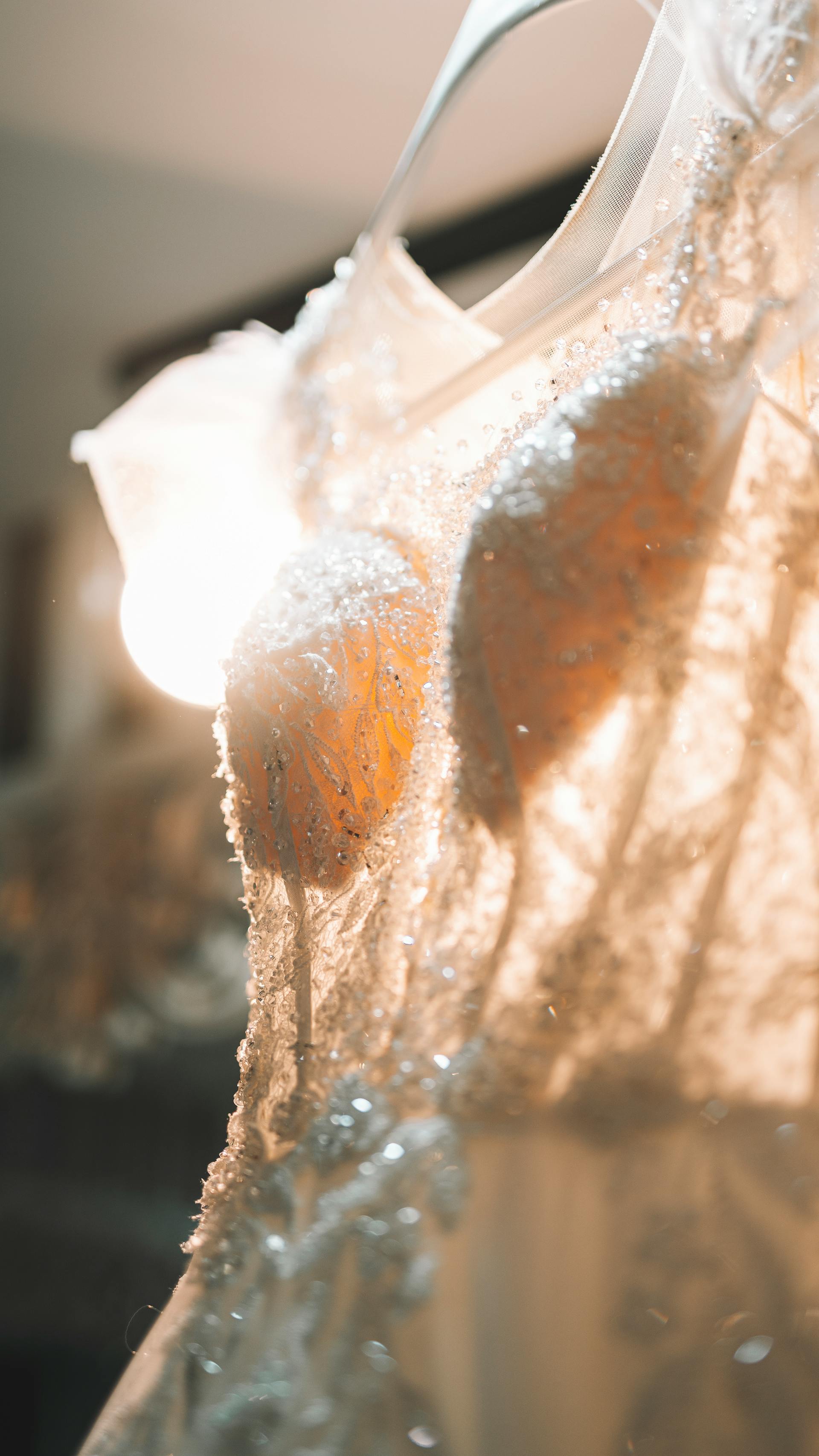 A close up of the beadwork on a wedding dress | Source: Pexels