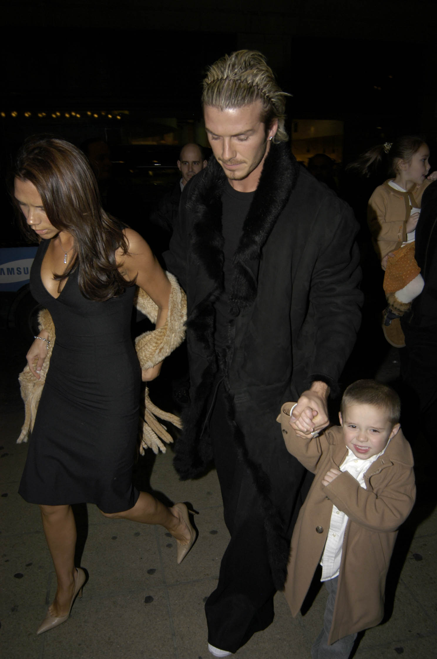 David, Victoria, and Brooklyn Beckham on October 28, 2002 at The London Palladium in London, England | Source: Getty Images