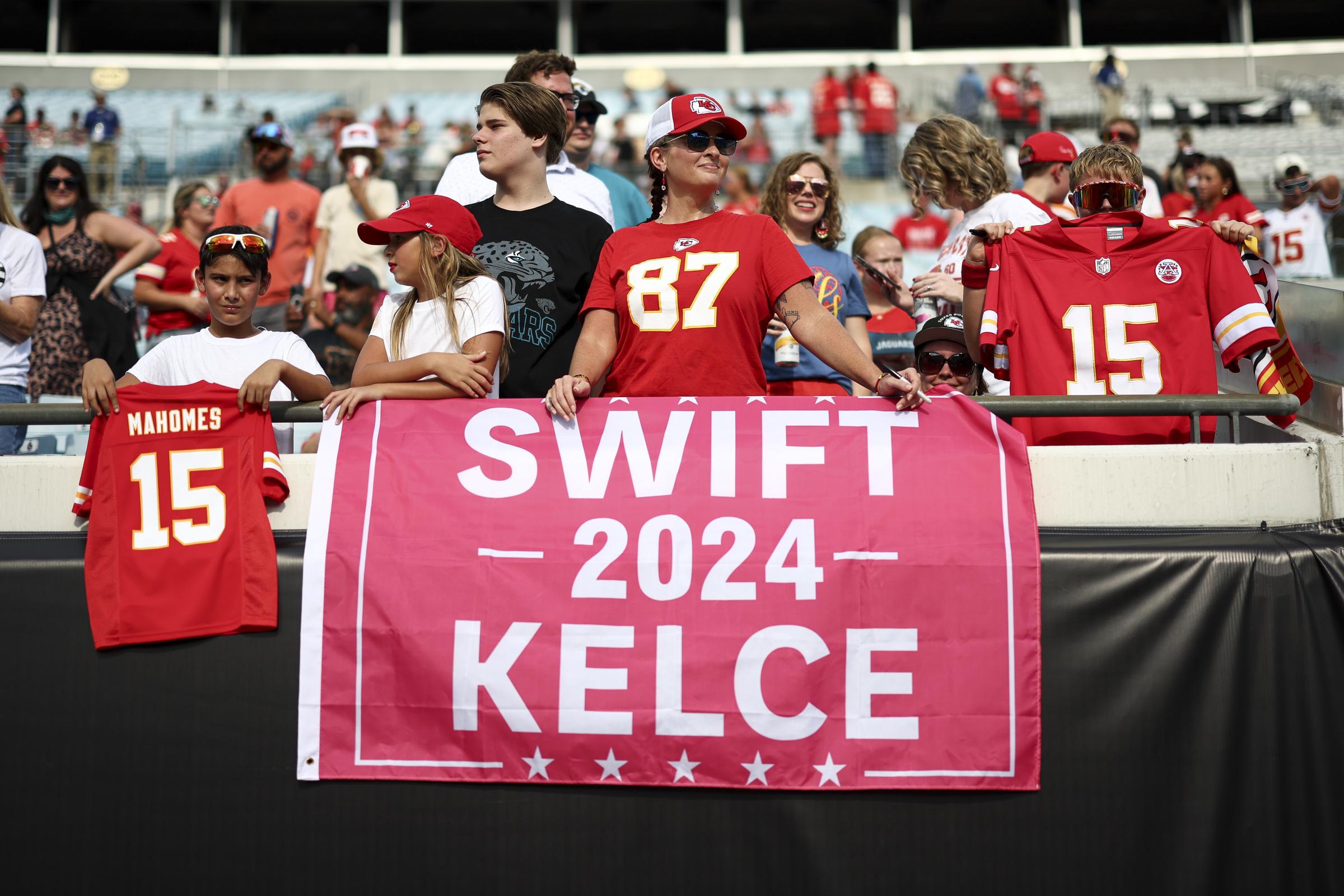 A Kansas City Chiefs fan with a banner bearing Swift and Kelce's names during an NFL pre-season football game at EverBank Stadium on August 10, 2024, in Jacksonville, Florida | Source: Getty Images