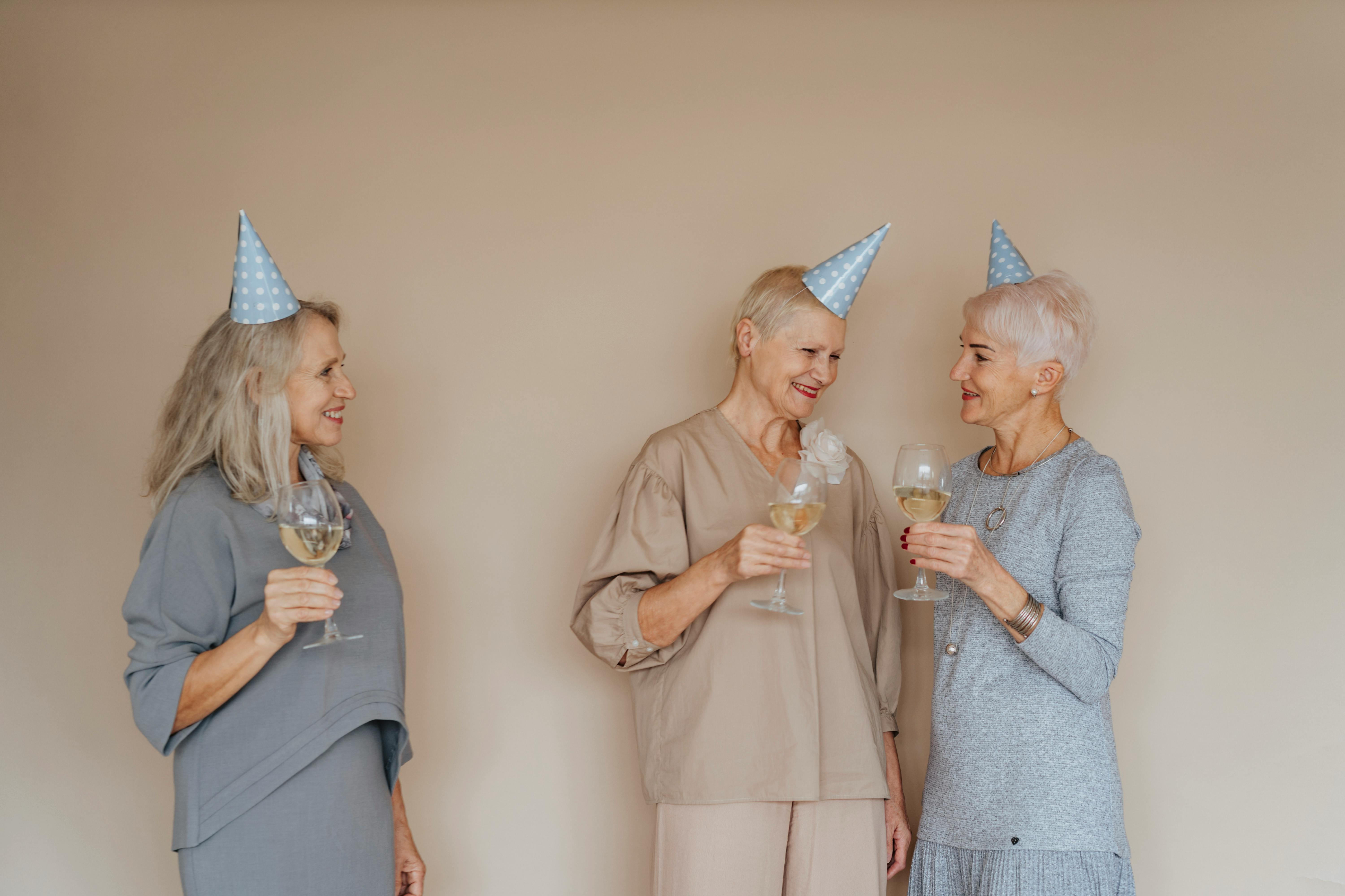 Friends enjoying wine | Source: Pexels
