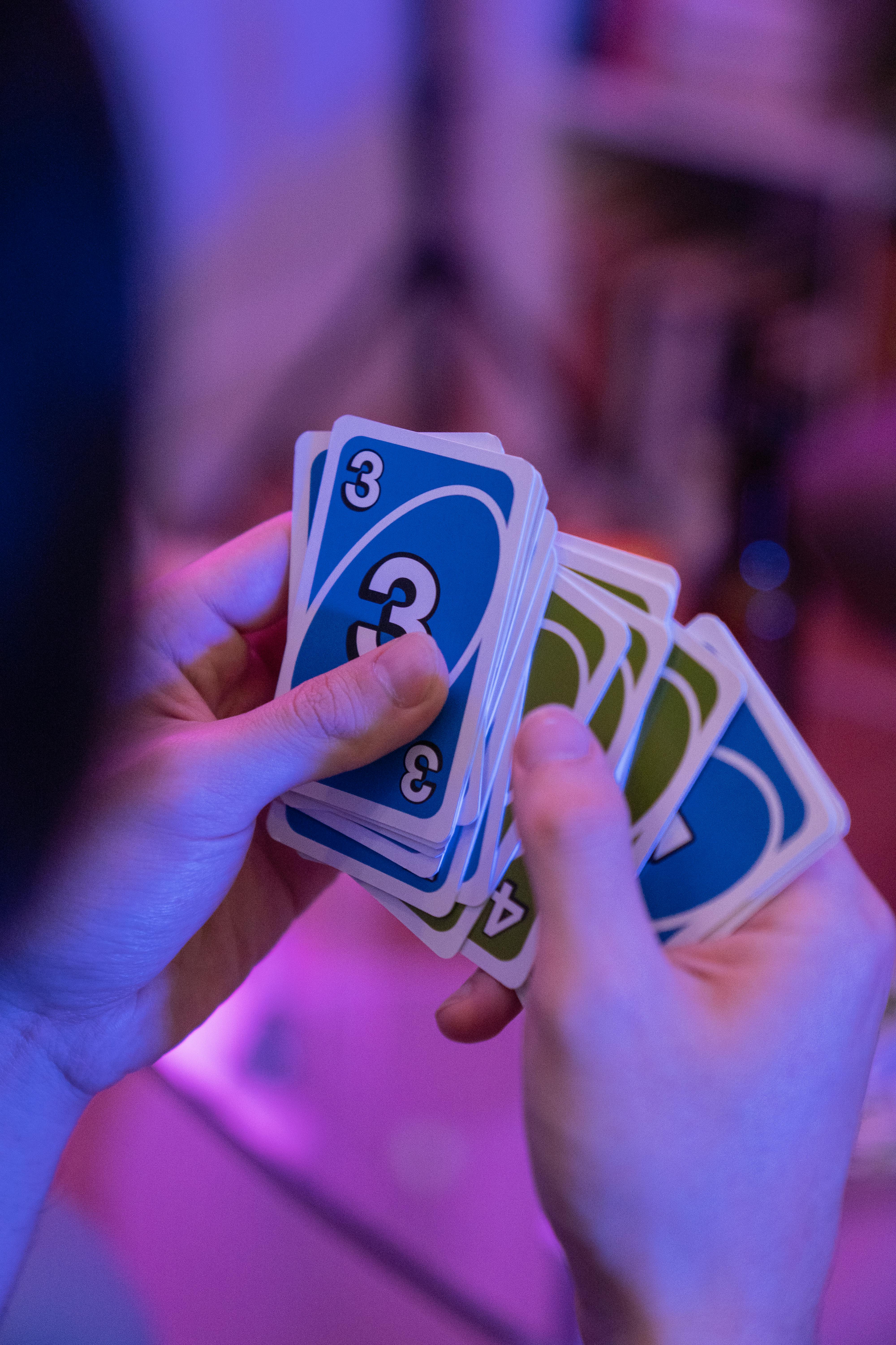 A person holding Uno cards | Source: Pexels
