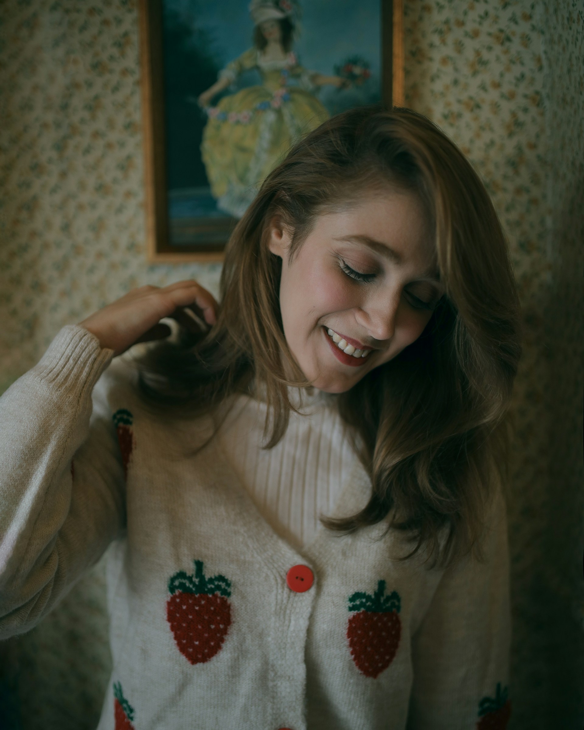 A happy woman standing in a hallway | Source: Unsplash
