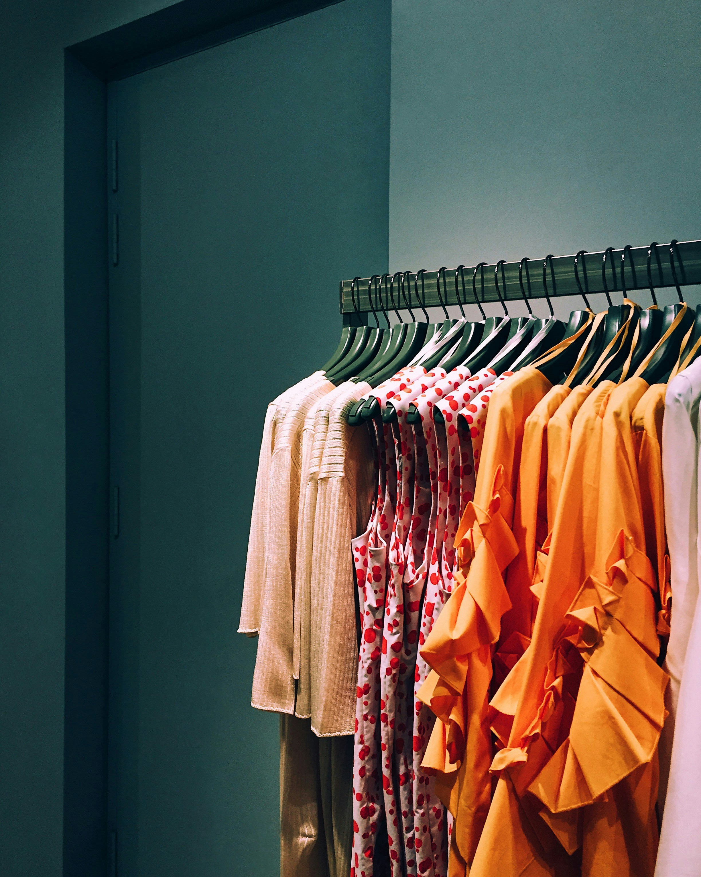 A rack of clothing at a store | Source: Unsplash