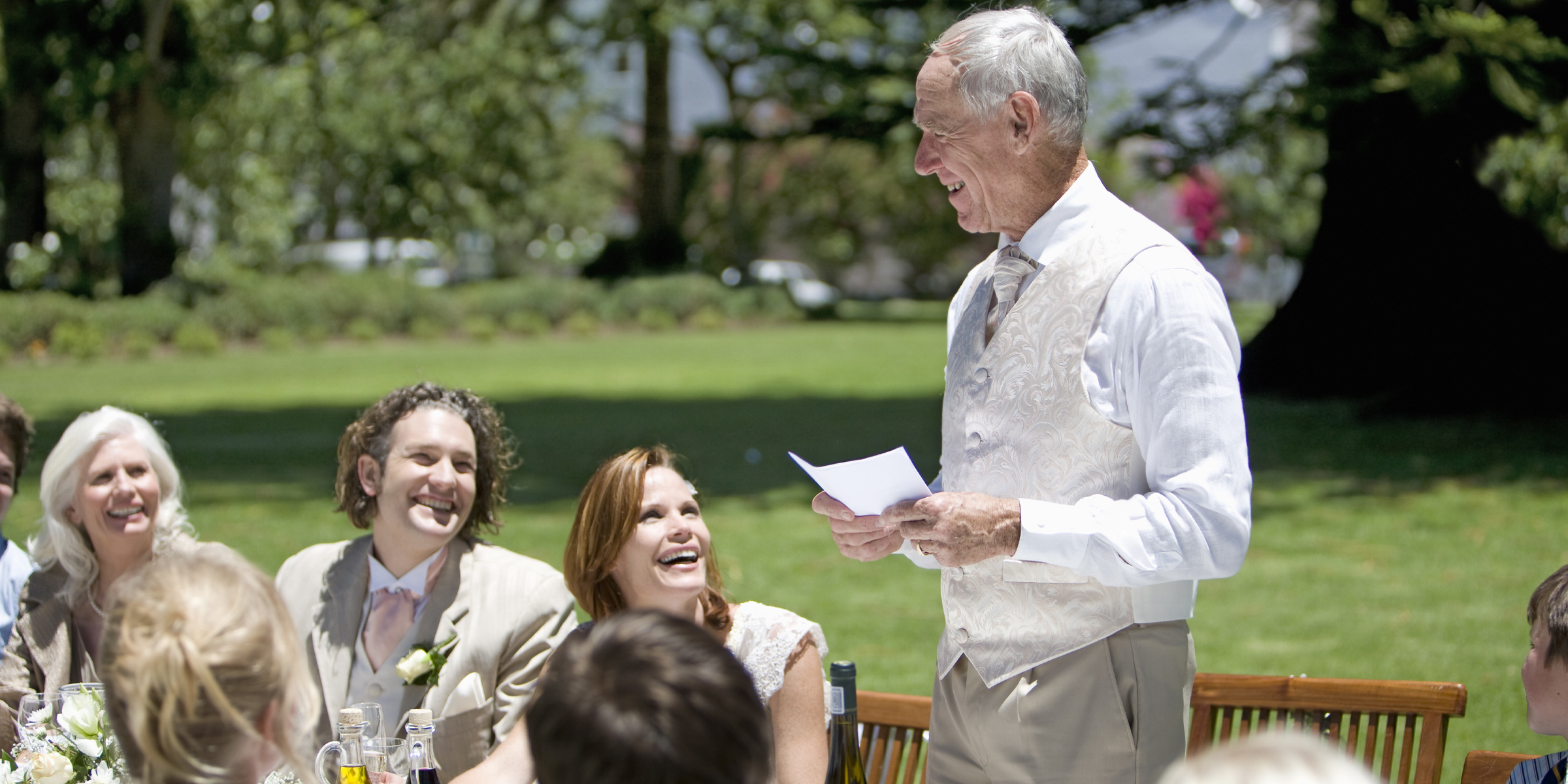 A man giving a speech at a wedding | Source: Shutterstock