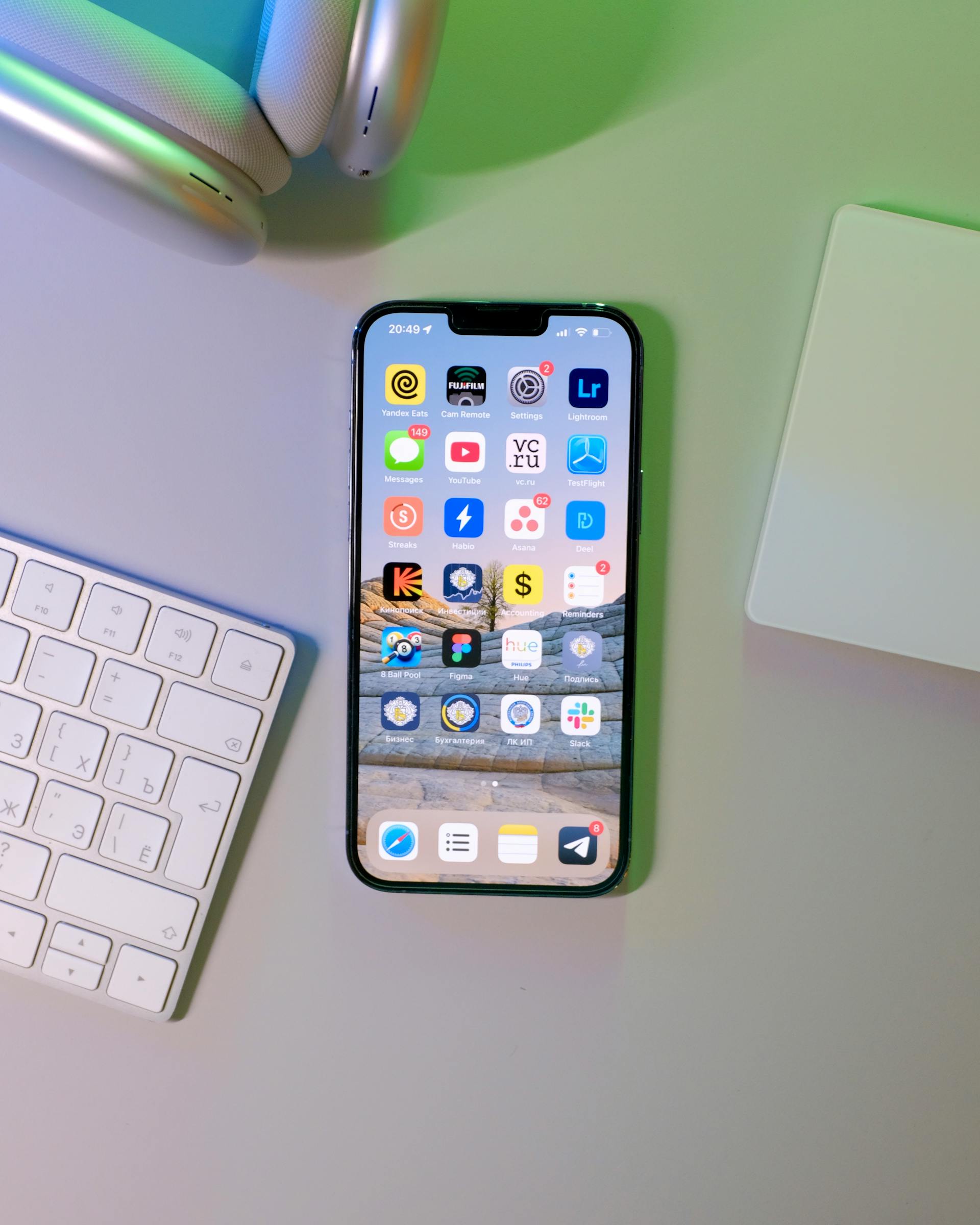 A cellphone sitting on a table next to a keyboard | Source: Pexels