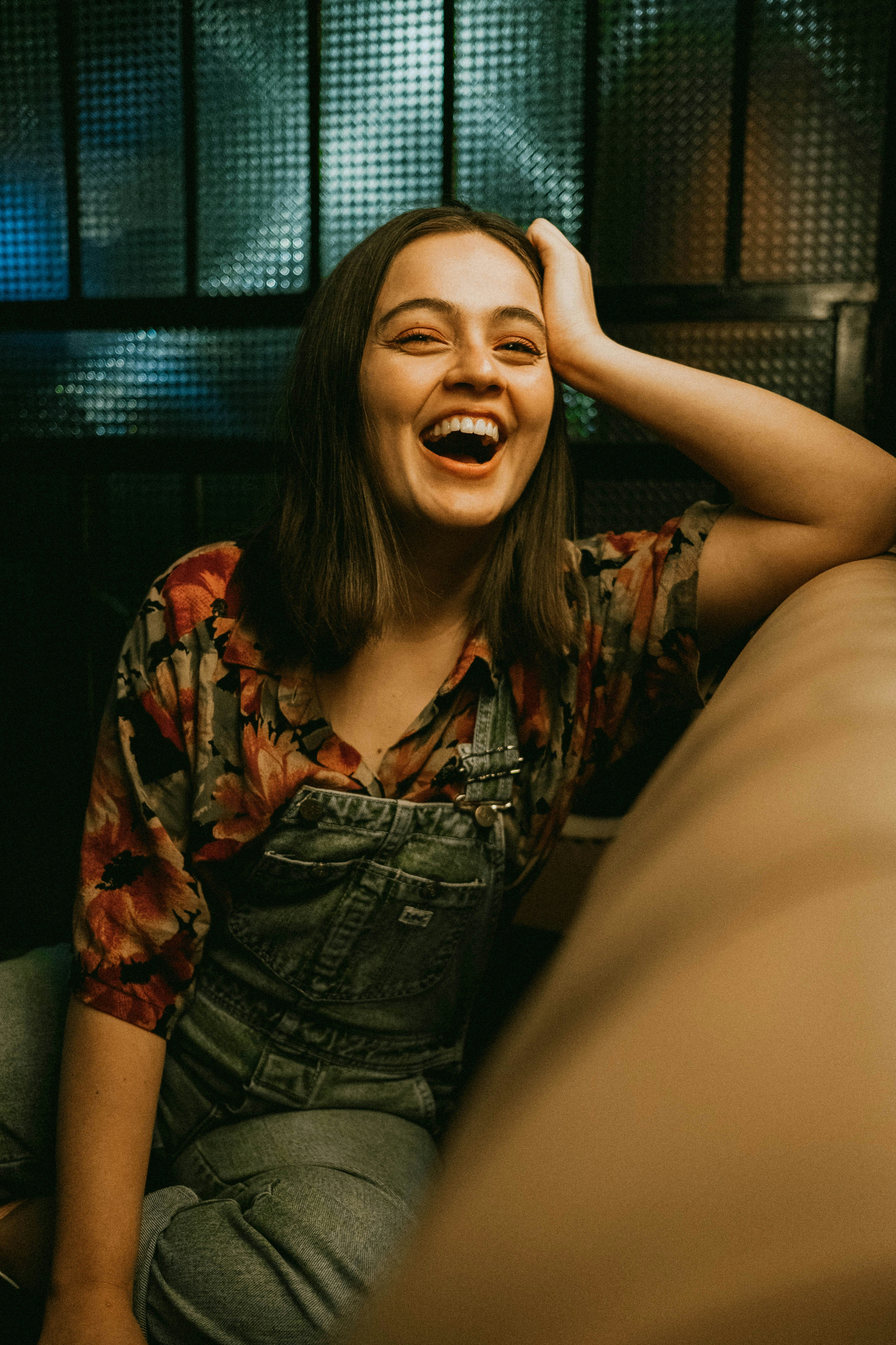 A girl laughing | Source: Unsplash