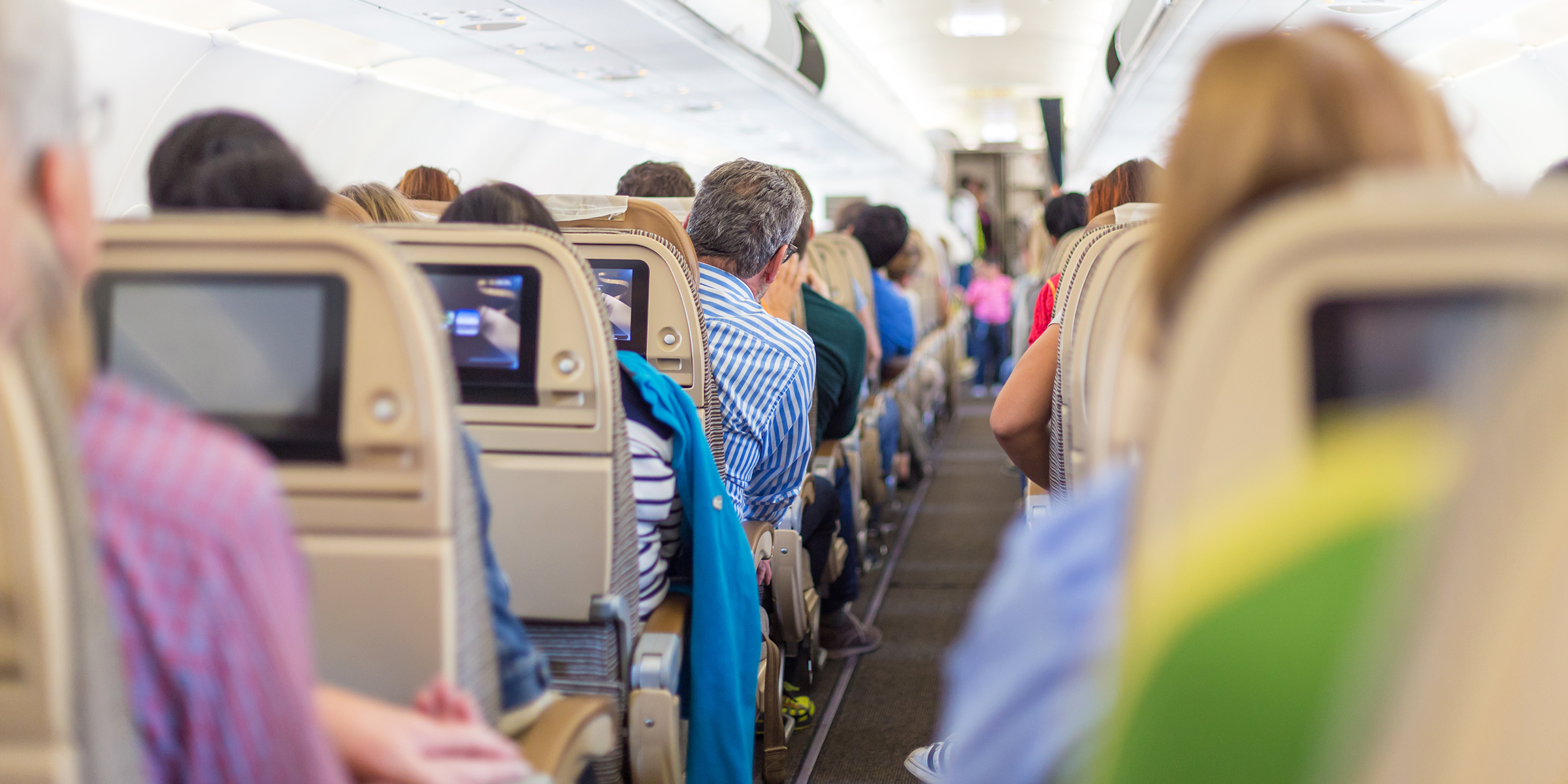 People in a plane | Source: Shutterstock