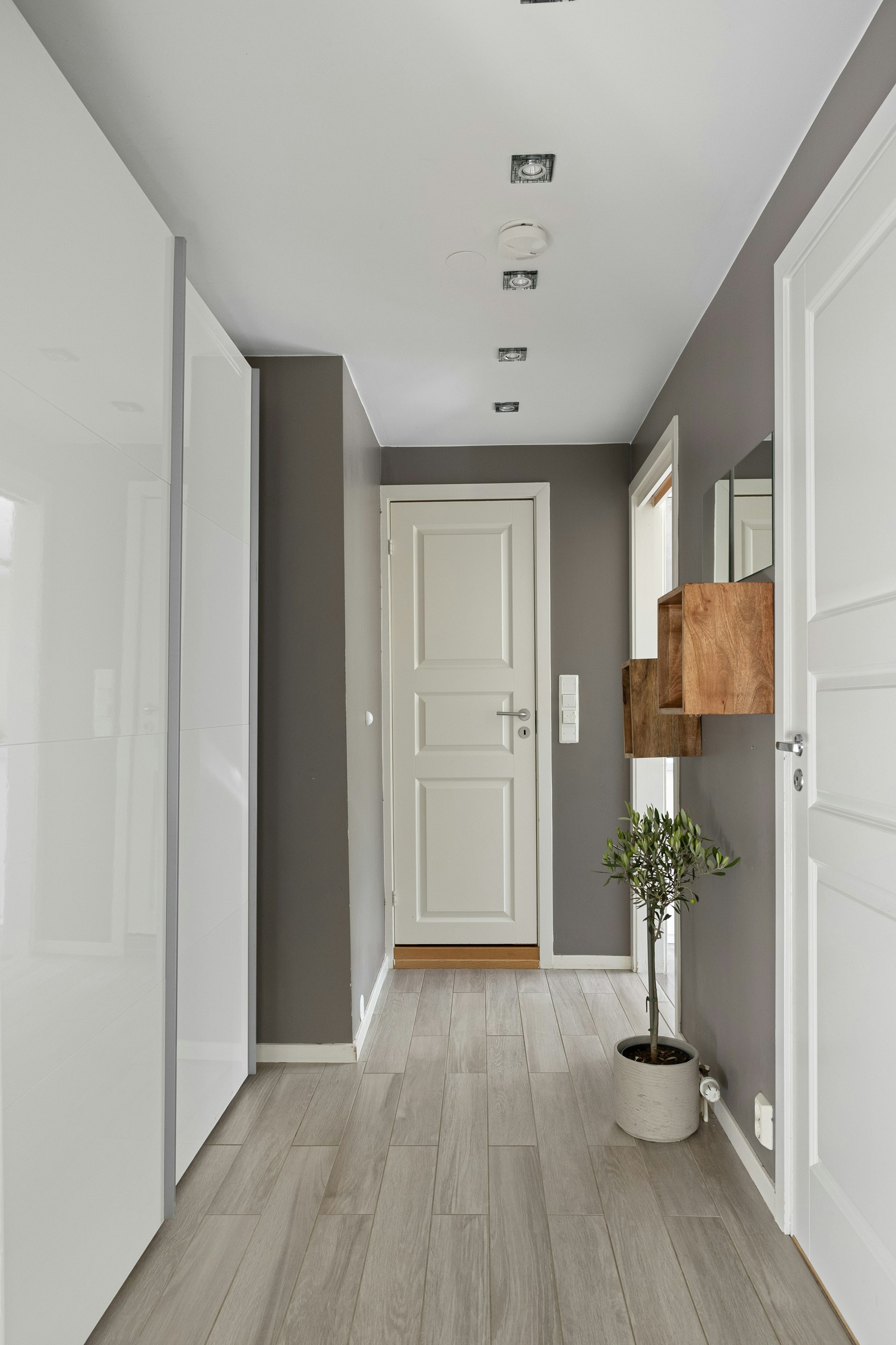 A door at the end of a hallway | Source: Unsplash