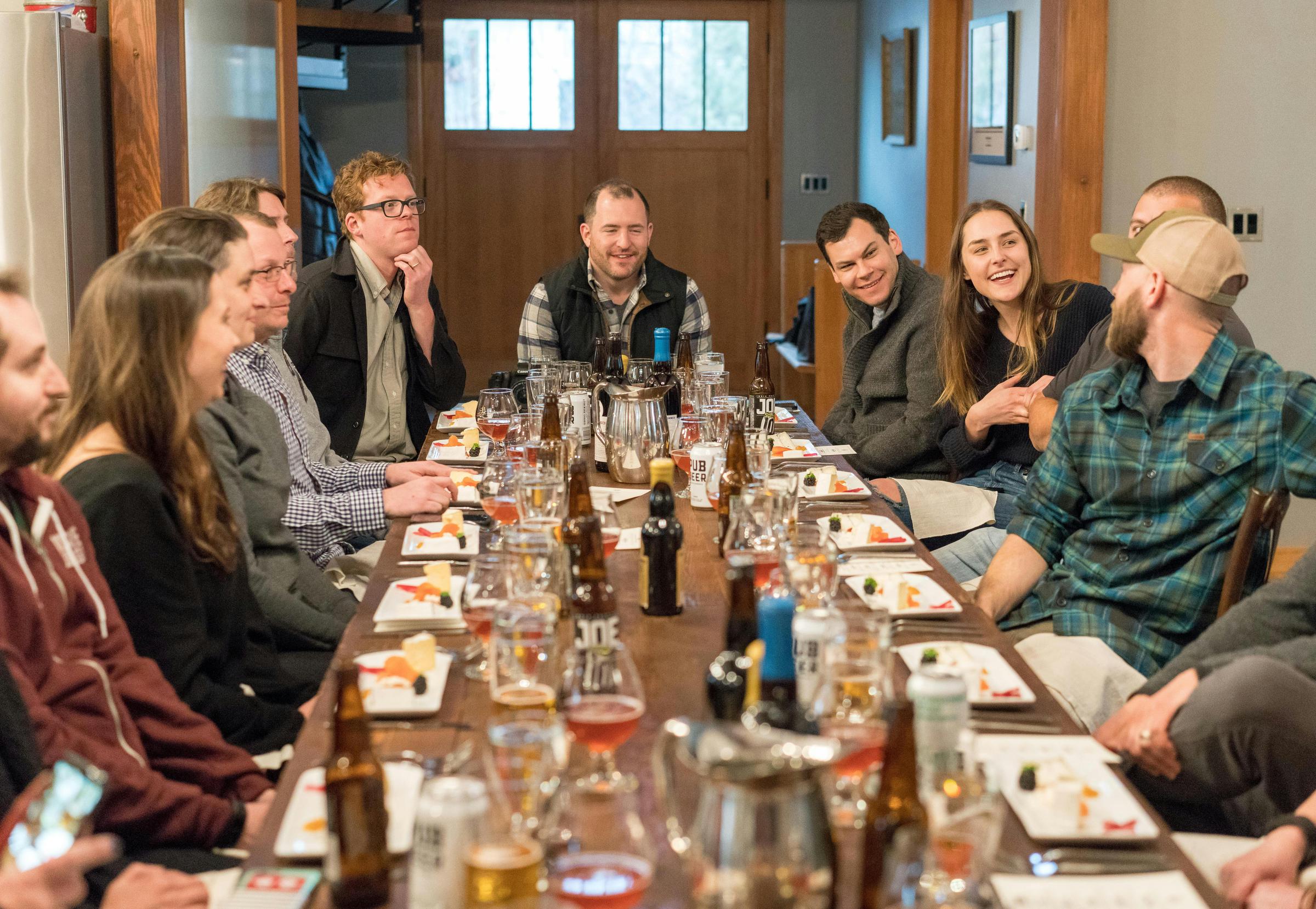People seated at a dinner table | Source: Pexels