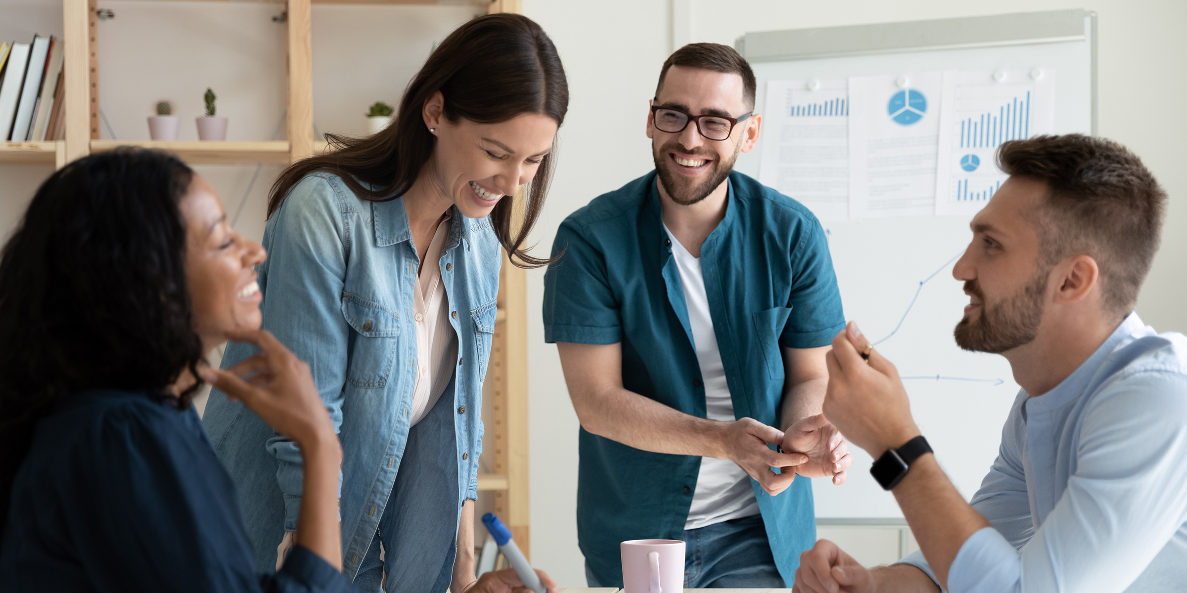 Staff at an office meeting | Source: Shutterstock