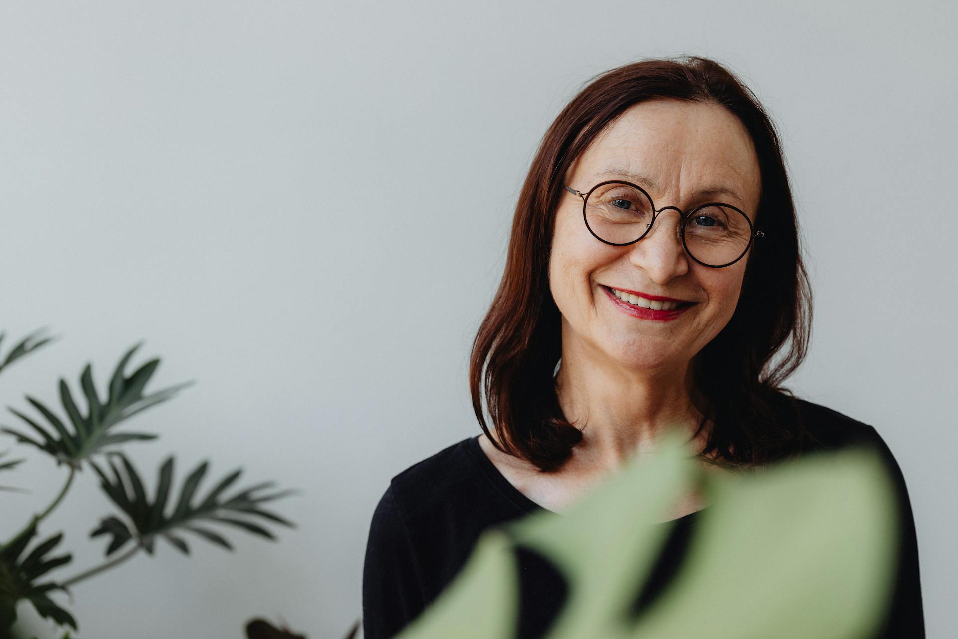A woman smiling at someone | Source: Pexels