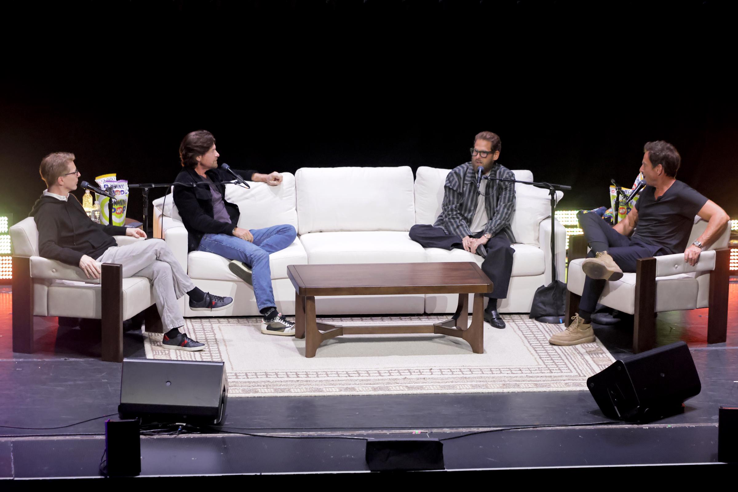 Sean Hayes, Jason Bateman, Jonah Hill and Will Arnett speak onstage during SiriusXM Presents SmartLess LIVE at Avalon Hollywood on April 25, 2026 in Los Angeles, California. | Source: Getty Images