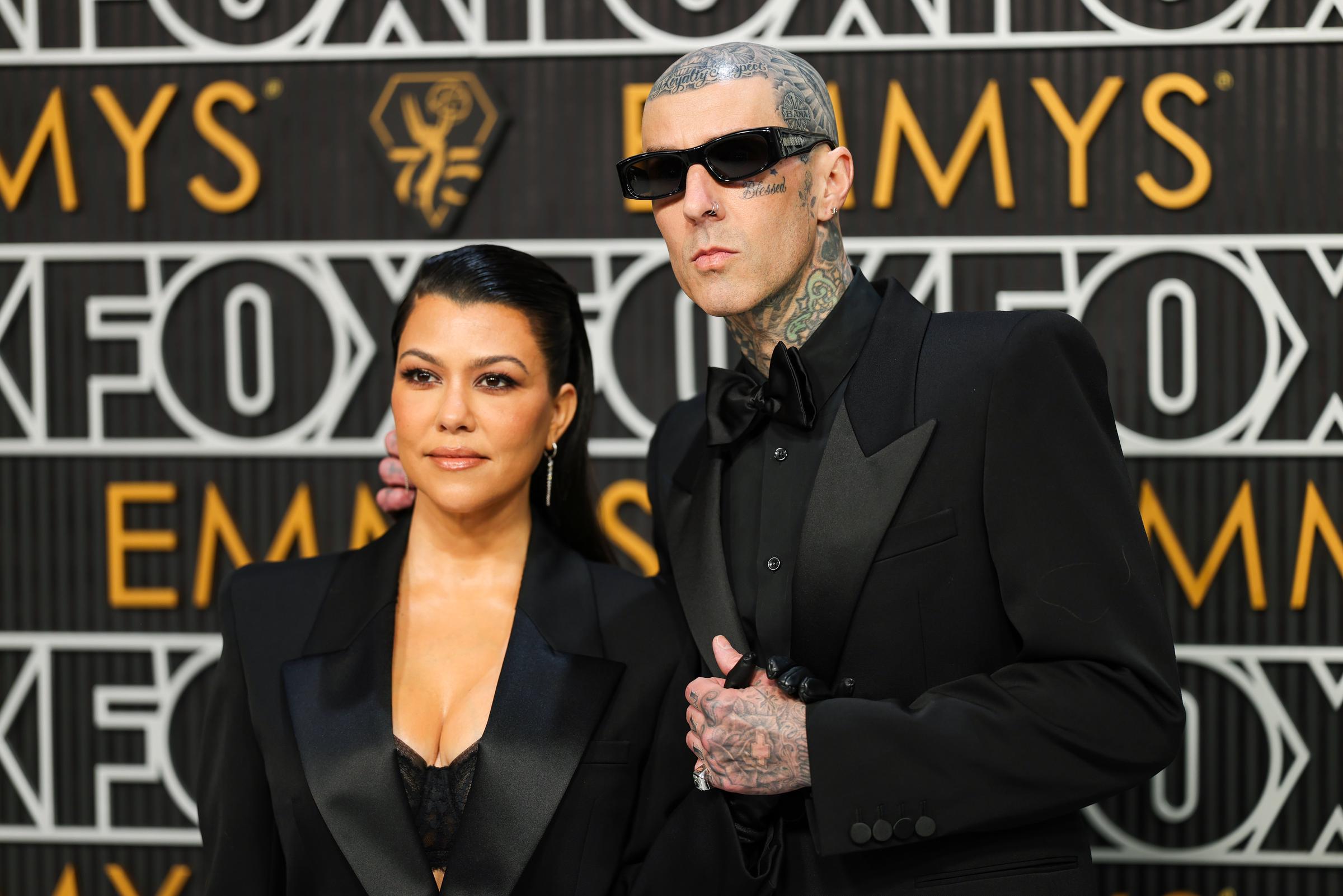 Kourtney Kardashian Barker and Travis Barker at the 75th Primetime Emmy Awards at Peacock Theater on January 15, 2024, in Los Angeles, California. | Source: Getty Images