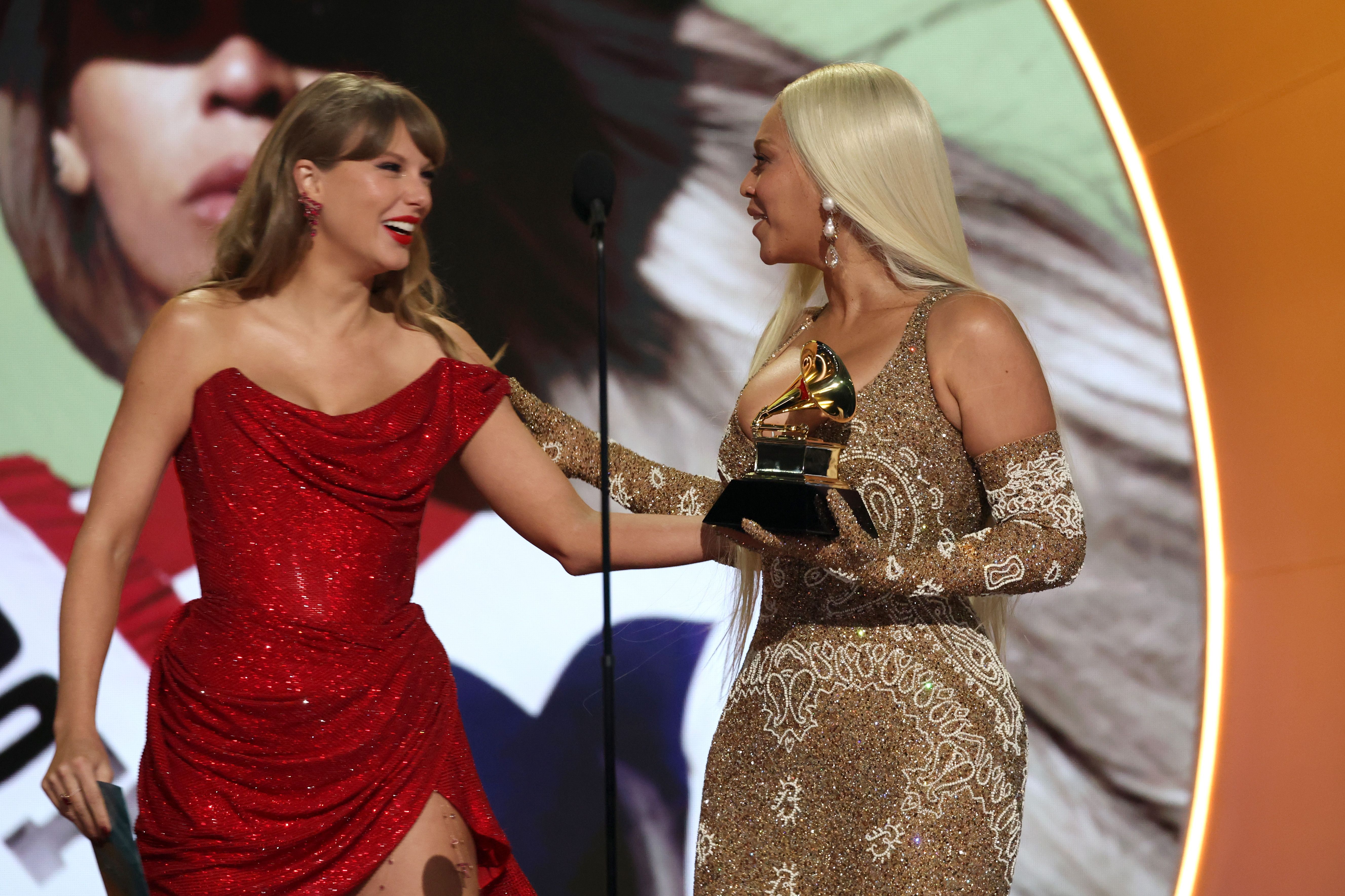 Taylor Swift presents Beyoncé with the Best Country Album award for "Cowboy Carter" at the 2025 Grammy Awards | Source: Getty Images