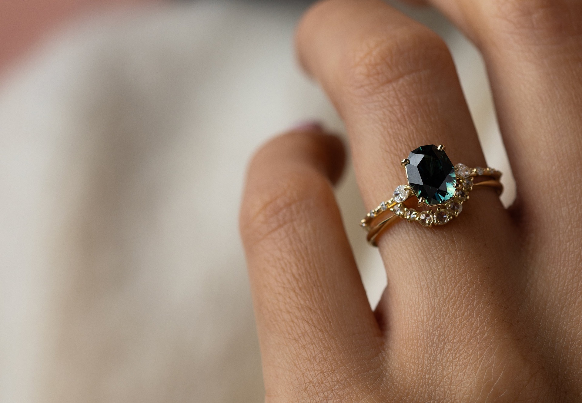 Close-up shot of a woman wearing a sapphire ring | Source: Pixabay