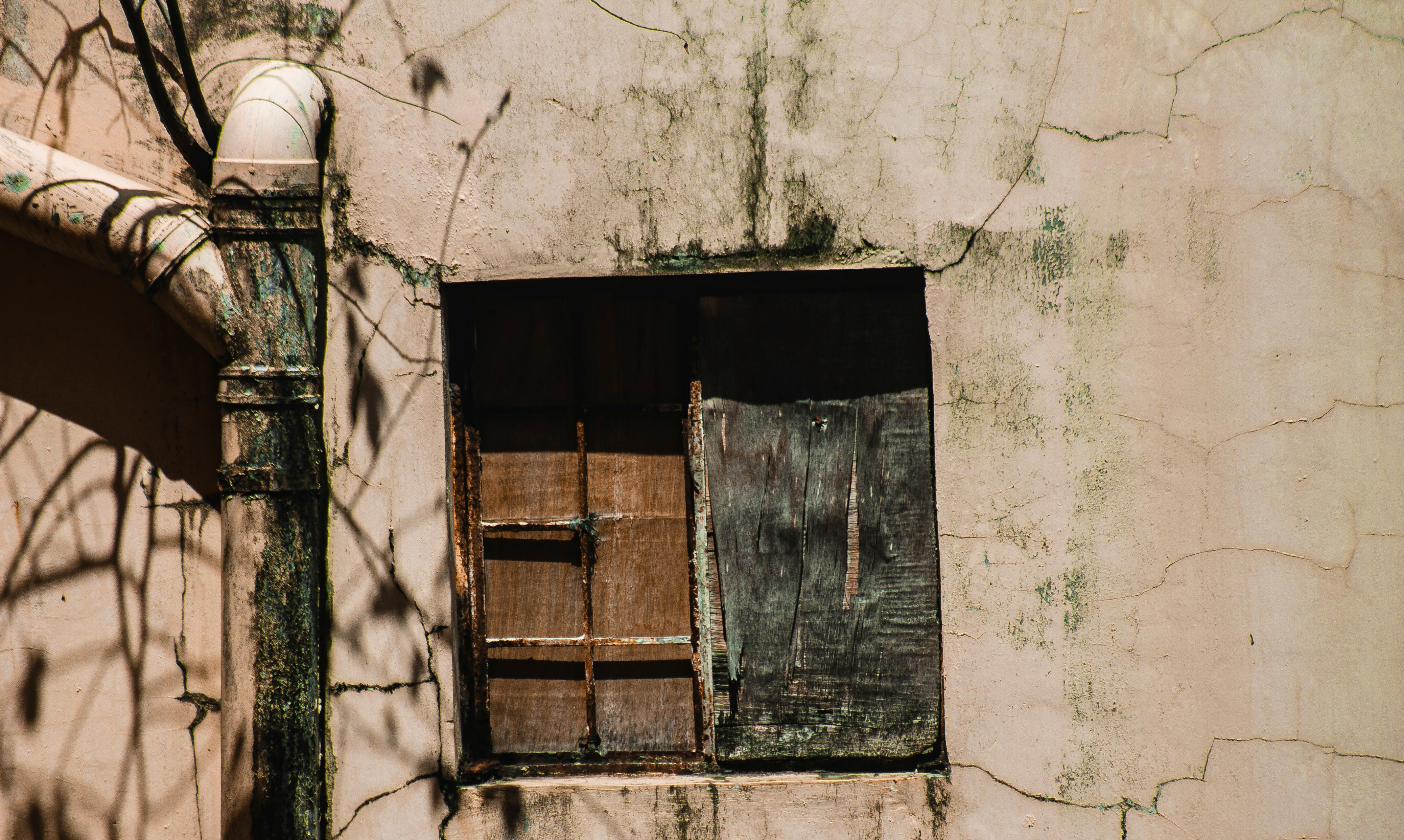 A boarded up window | Source: Pexels